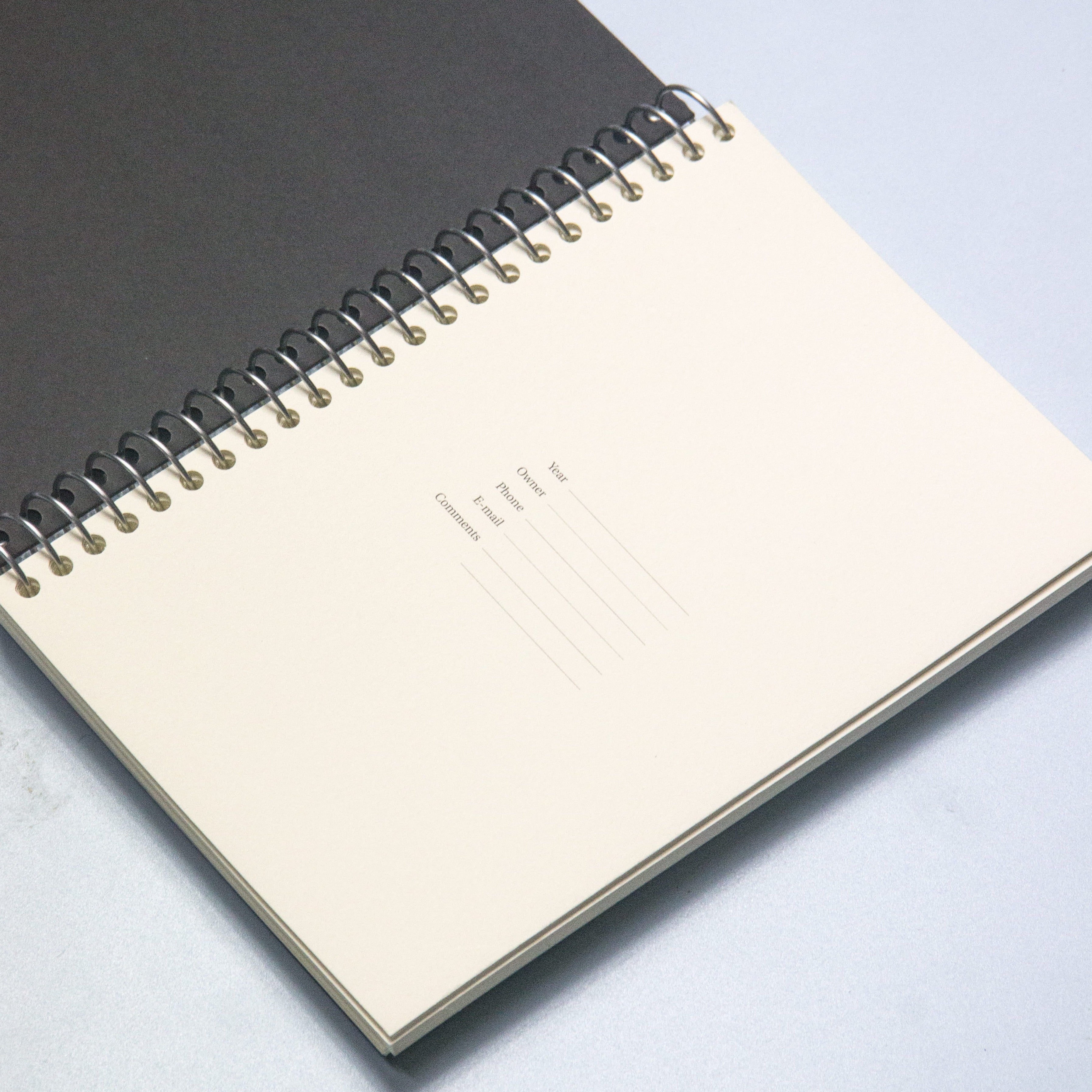 Best black cover spiral notebook. From Octàgon Design