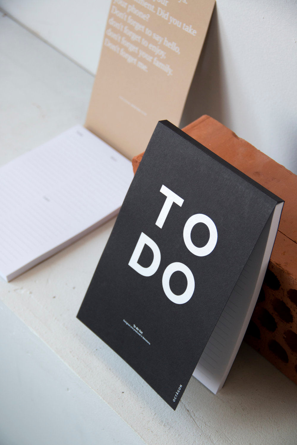 OCTÀGON DESIGN | To Do | Notepad | Black color and white typography. 