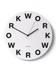 "Work" clock on a white wall | Reloj "Work" en una pared blanca. | Rellotge "Work" en una paret blanca.