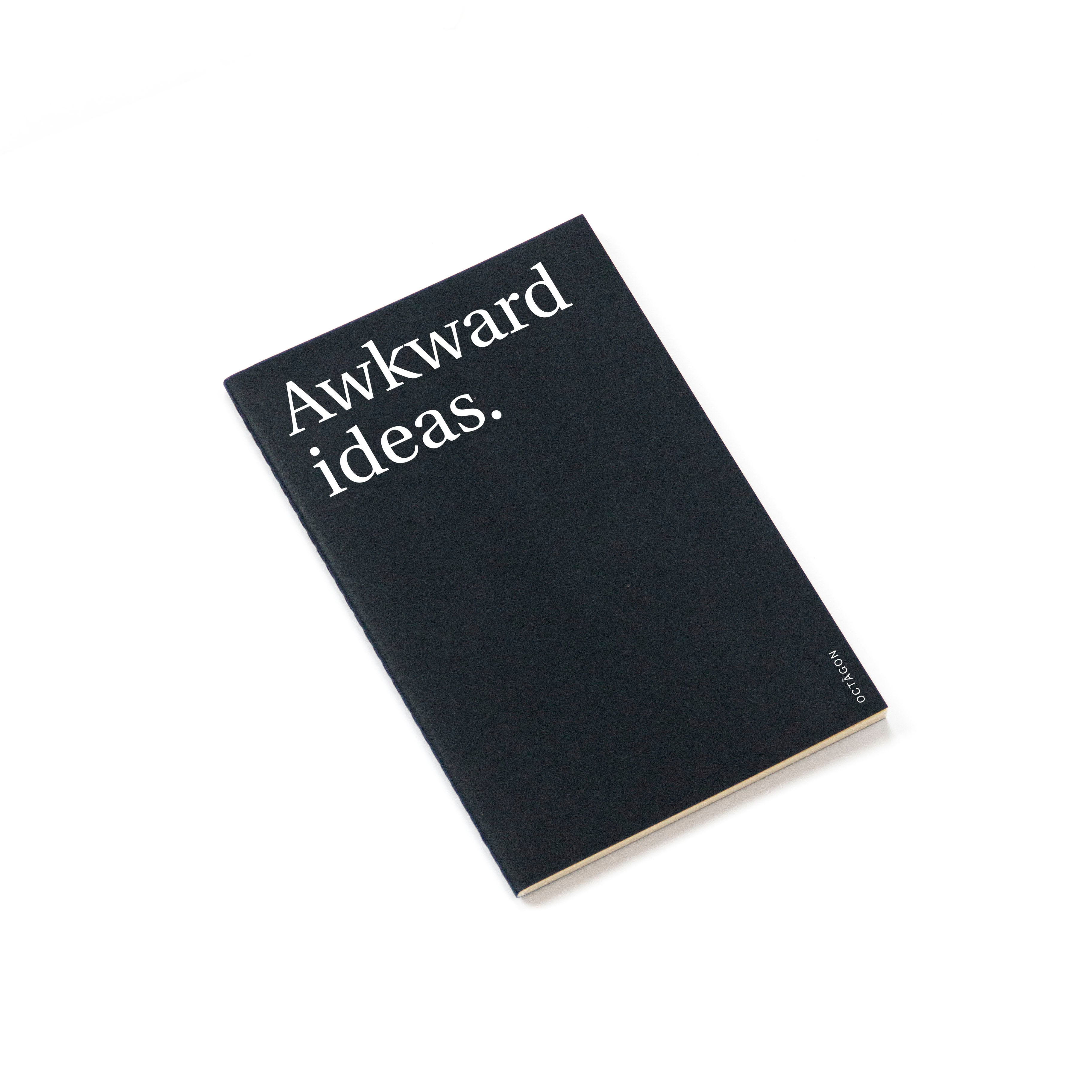 OCTÀGON DESIGN | &quot;Awkward ideas&quot; thin notebook. Cover black color and white typography.