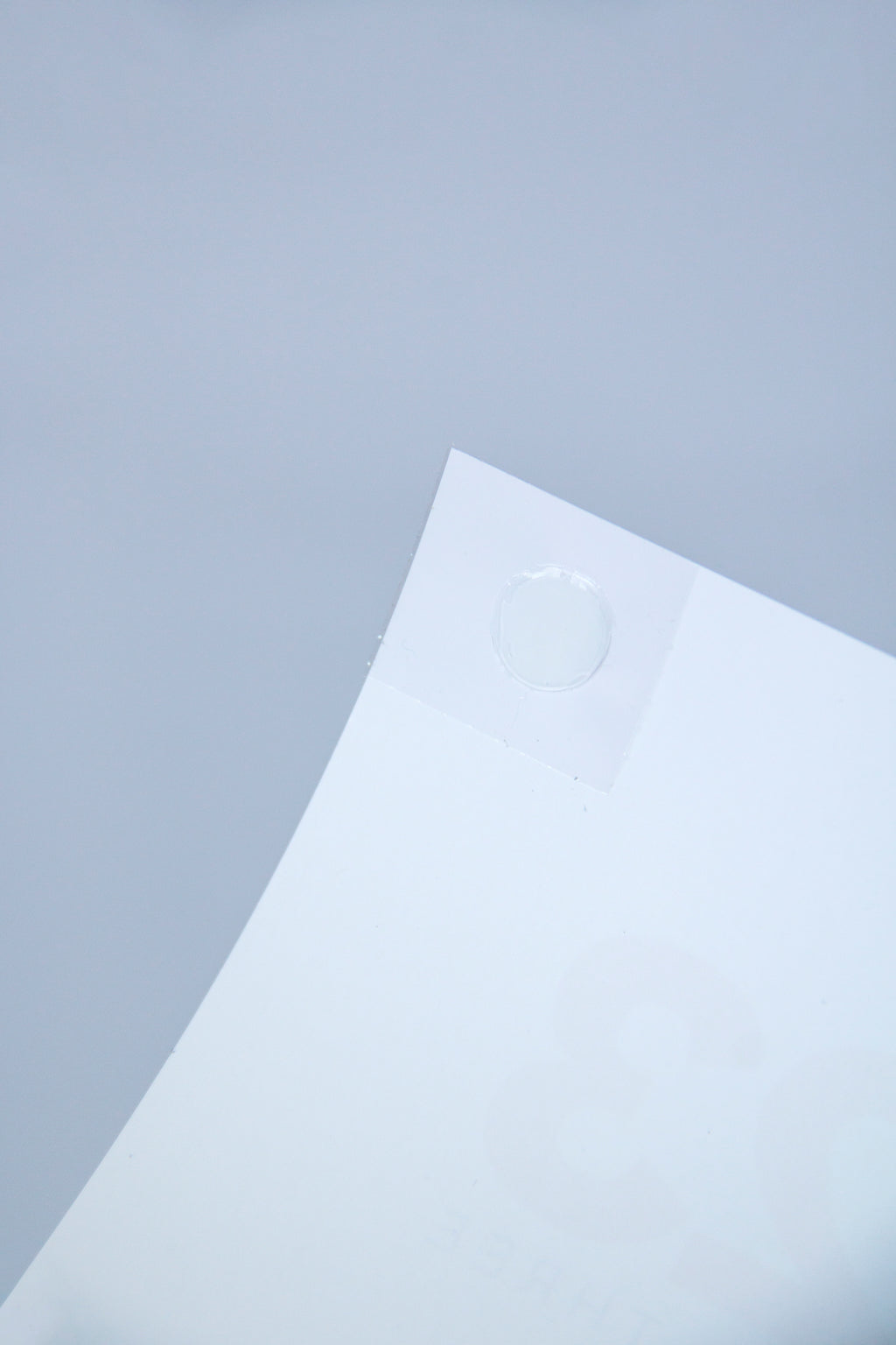 The back of the Octàgon Calendar features adhesive dots for easy wall mounting.