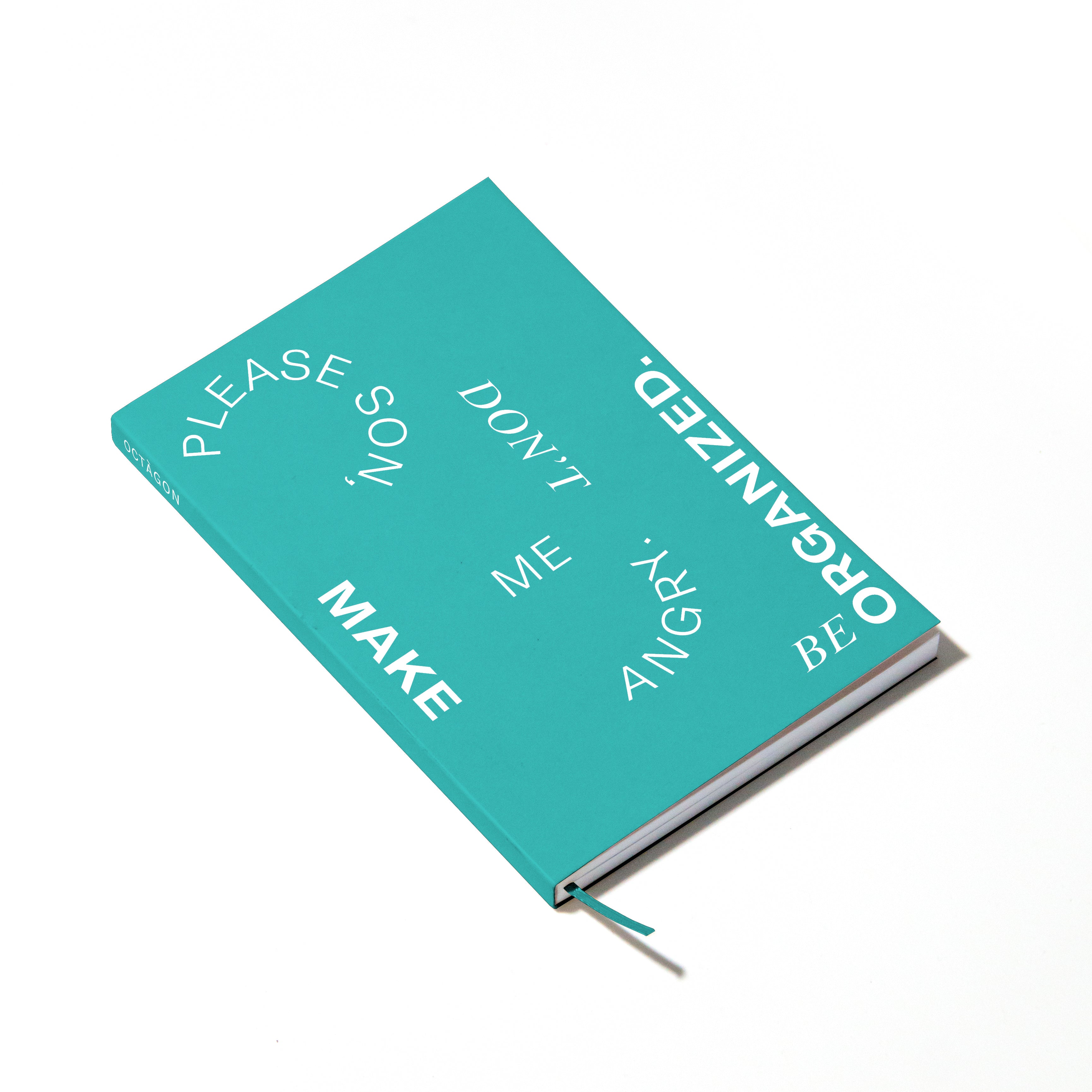 OCTÀGON DESIGN | Organized Notebook | Blue cover with white typography.