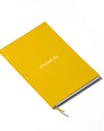 OCTÀGON DESIGN | Answers Notebook | Yellow cover and white typography.  