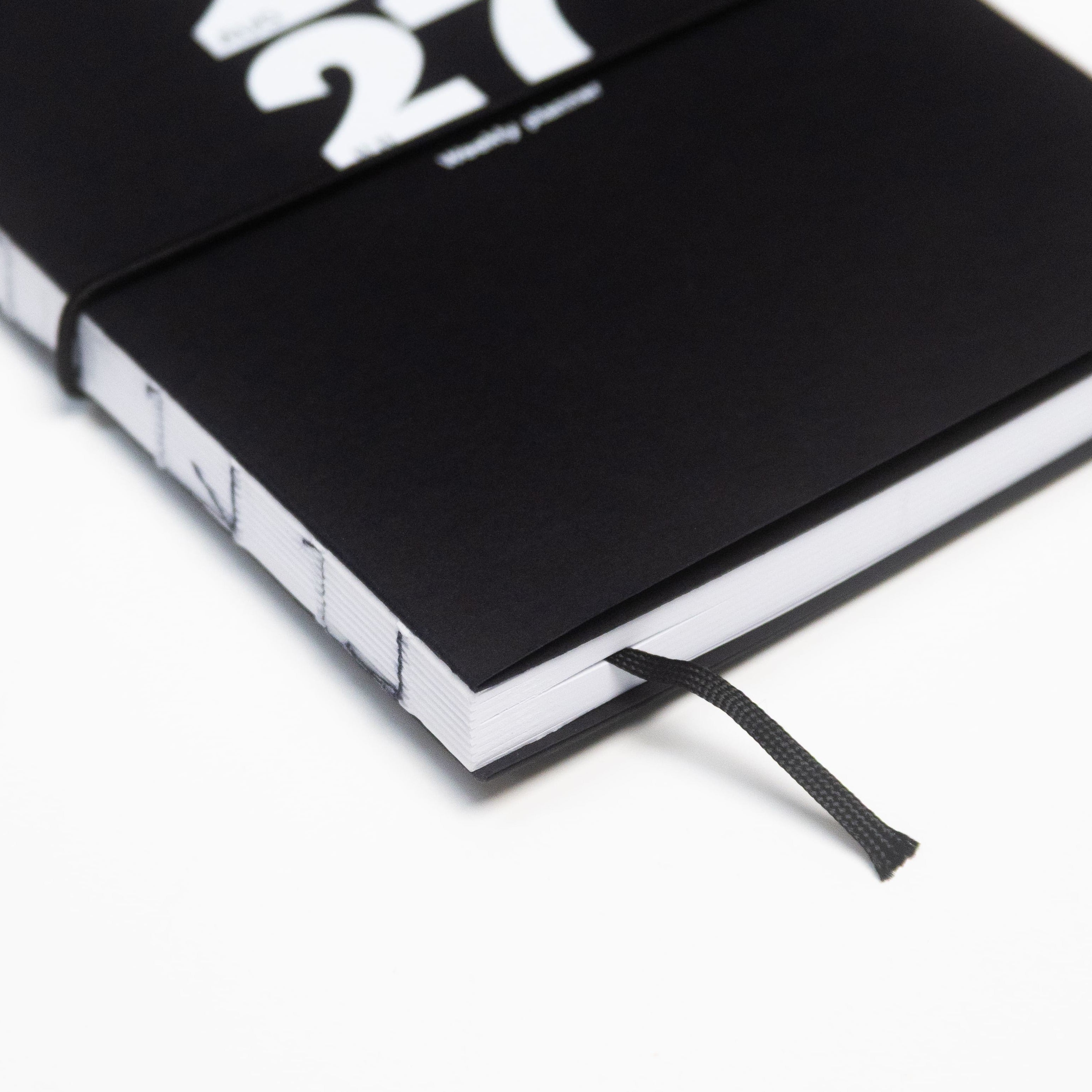 2026-2027 Academic Weekly Planner black with exposed spine and elastic band - Octàgon Design