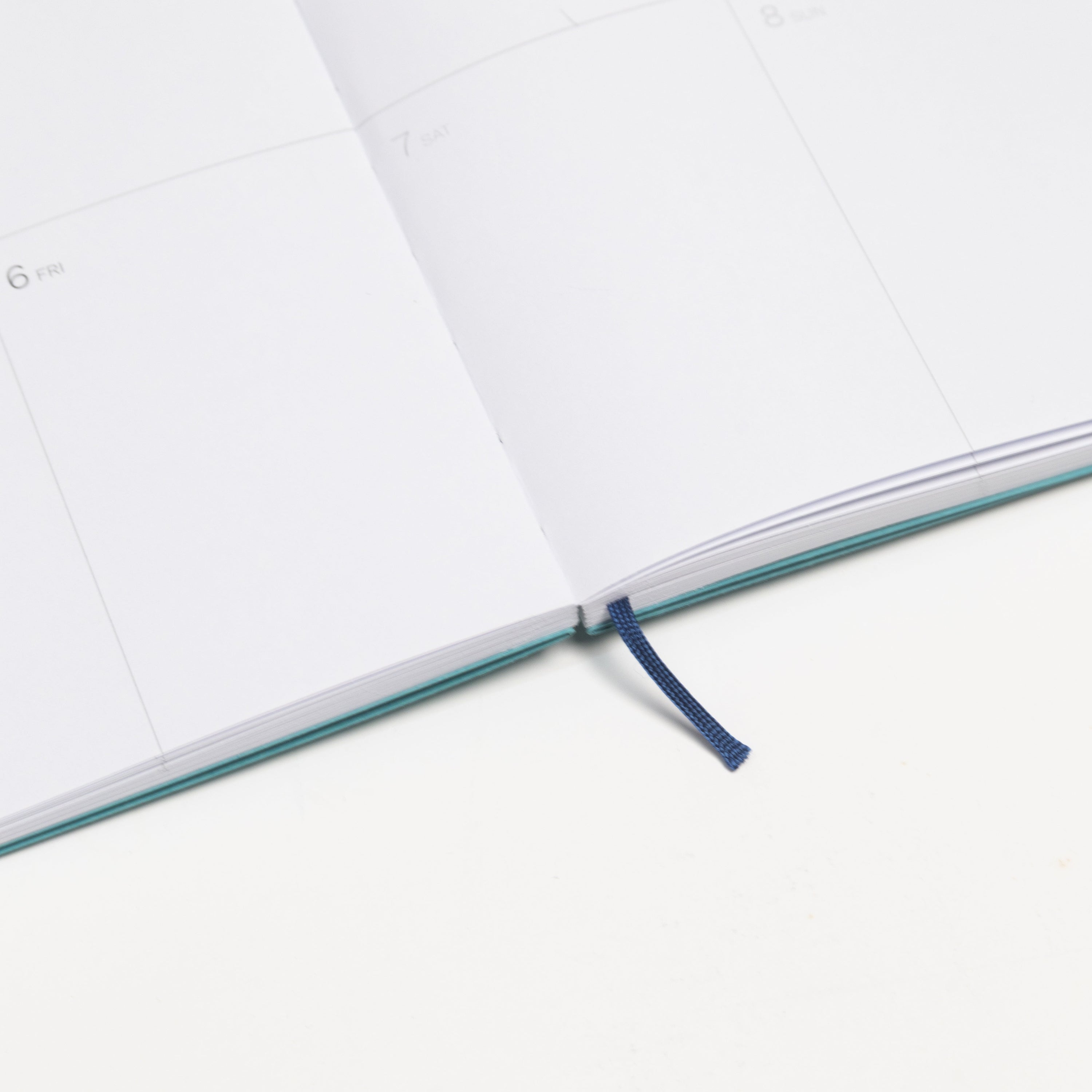 2026-2027 Academic Weekly Planner Caribbean Blue with exposed spine and elastic band - Octàgon Design