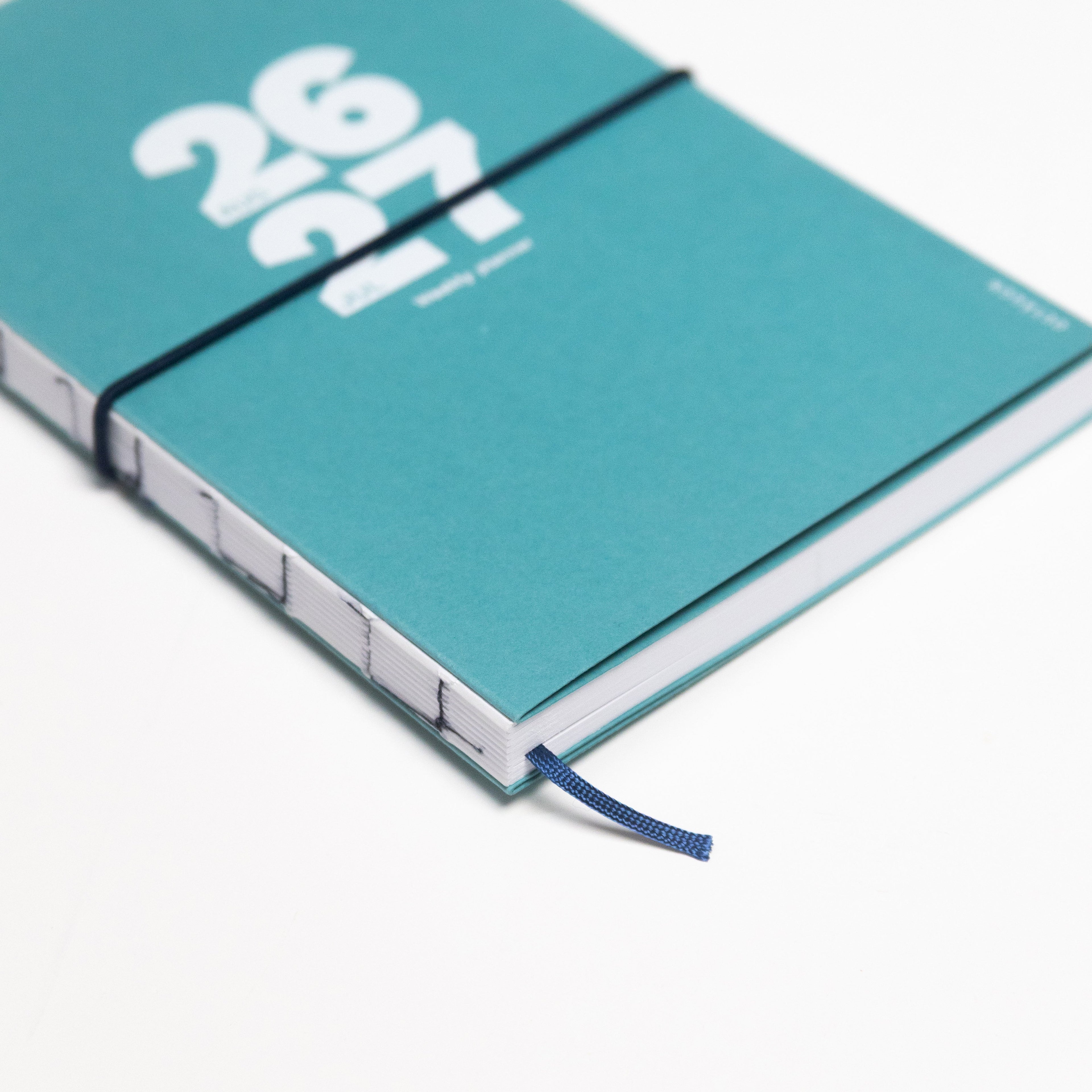 2026-2027 Academic Weekly Planner Caribbean Blue with exposed spine and elastic band - Octàgon Design