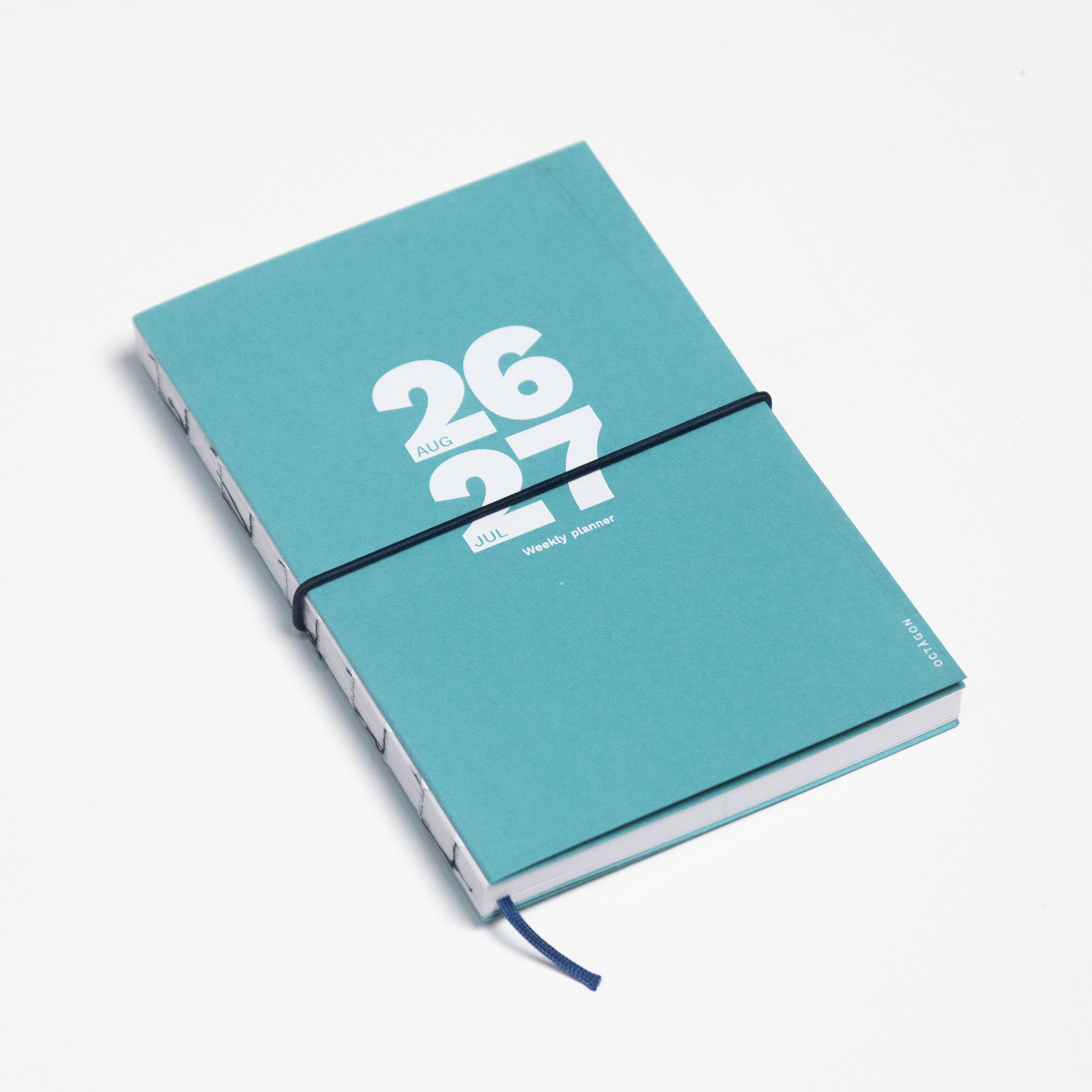 2026-2027 Academic Weekly Planner Caribbean Blue with exposed spine and elastic band - Octàgon Design