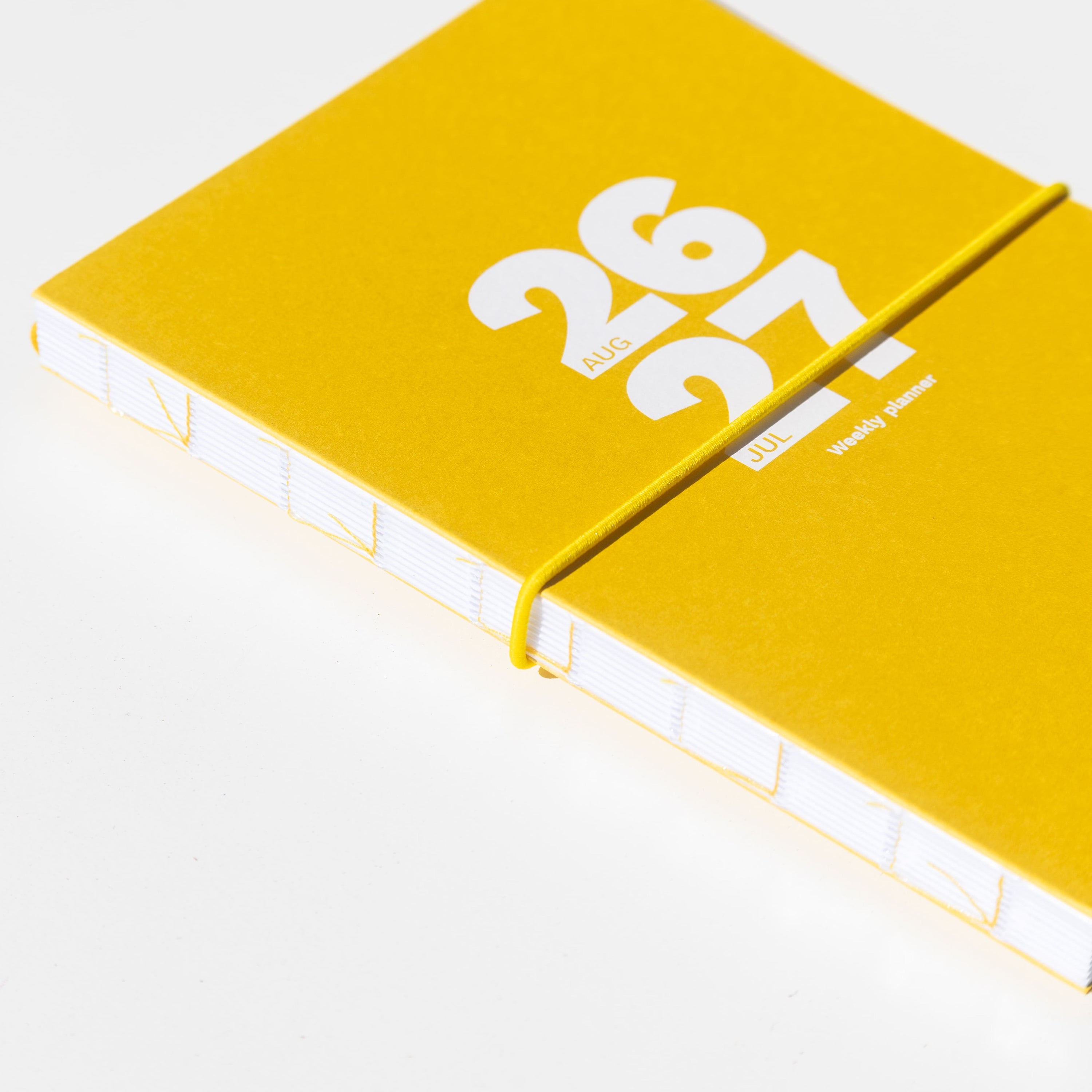 2026-2027 Academic Weekly Planner Indian Yellow elastic band - Octàgon Design