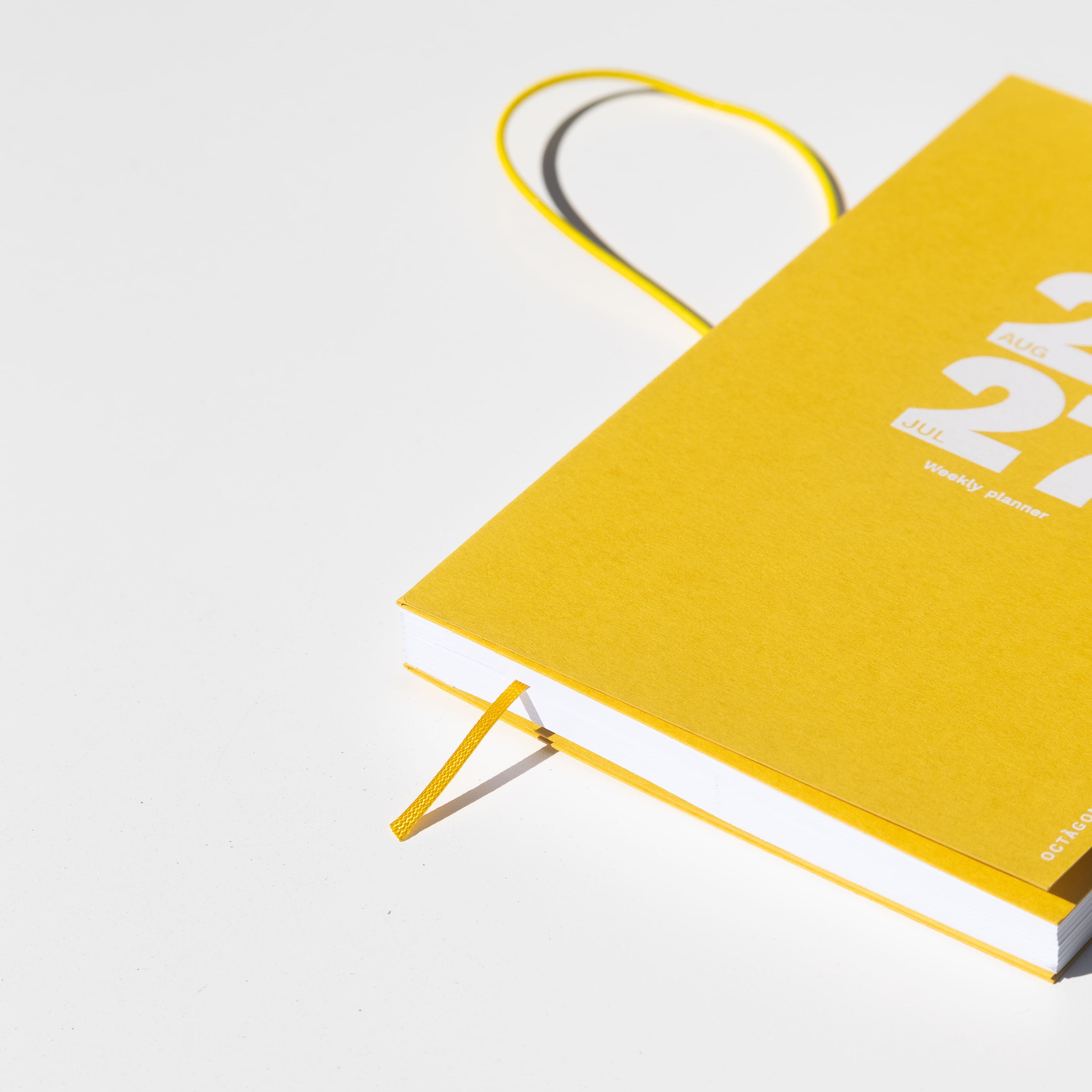 2026-2027 Academic Weekly Planner Indian Yellow cover detail- Octàgon Design