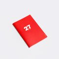 The iconic Mini Monthly Planner similar A6 size by Octàgon Design. Main cover.