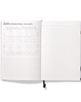 Octàgon Design 2025 Weekly Planner similar A5 size Black, international holidays