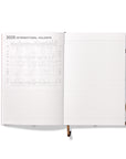 Octàgon Design 2025 Weekly Planner similar A5 size Kraft, international holidays