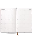 Octàgon Design 2025 Weekly Planner similar A5 size Kraft, front cover, monthly template