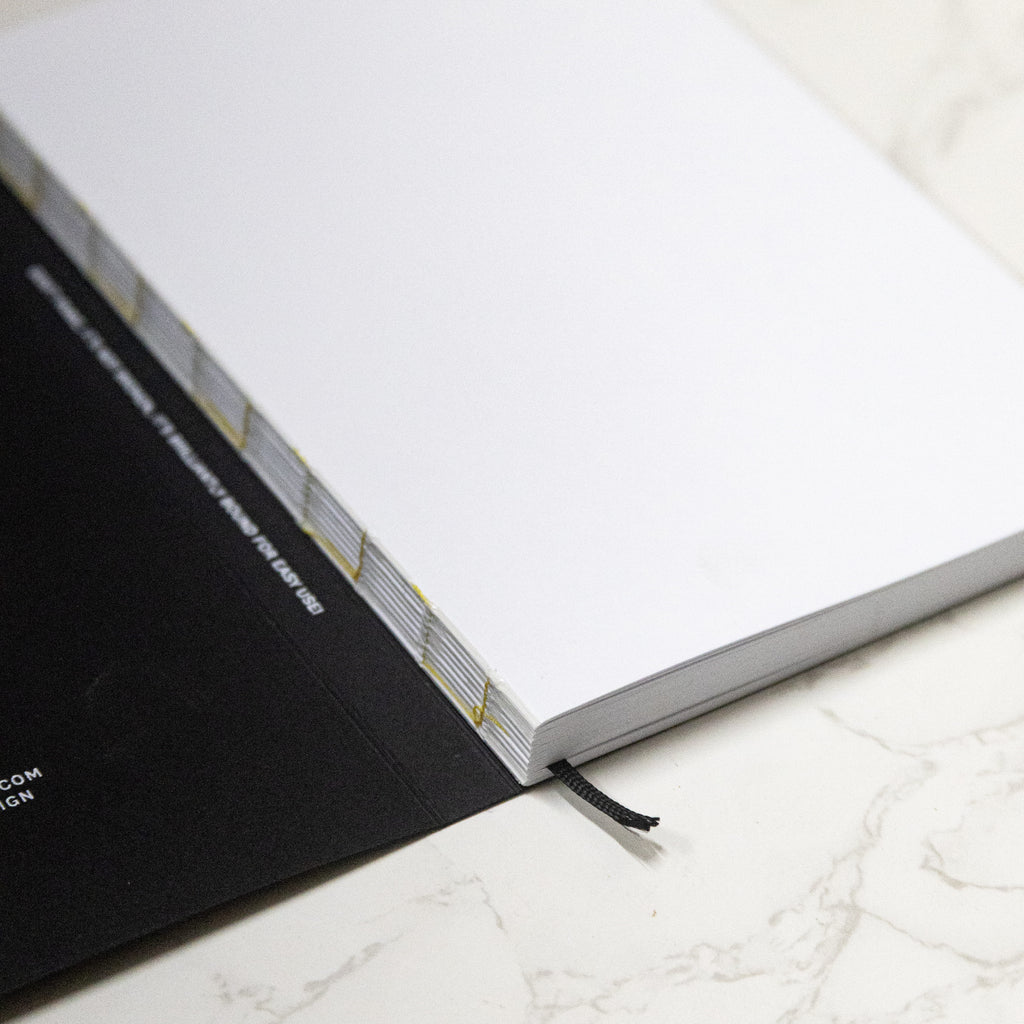 2026 Weekly Planner, best planner. From Octàgon Design. Black color. Binding detail.