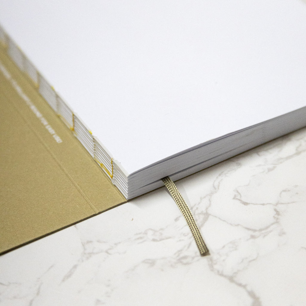 2026 Weekly Planner, best planner. From Octàgon Design. Camel cover. Binding detail.