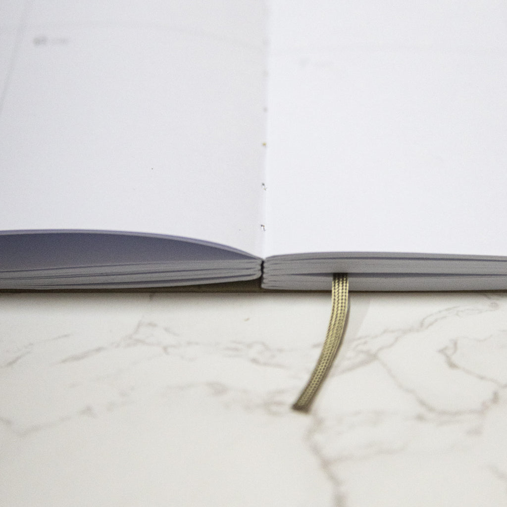 Best 2026 weekly planner A4 size from Octàgon Design. Camel color. Lay Flat.