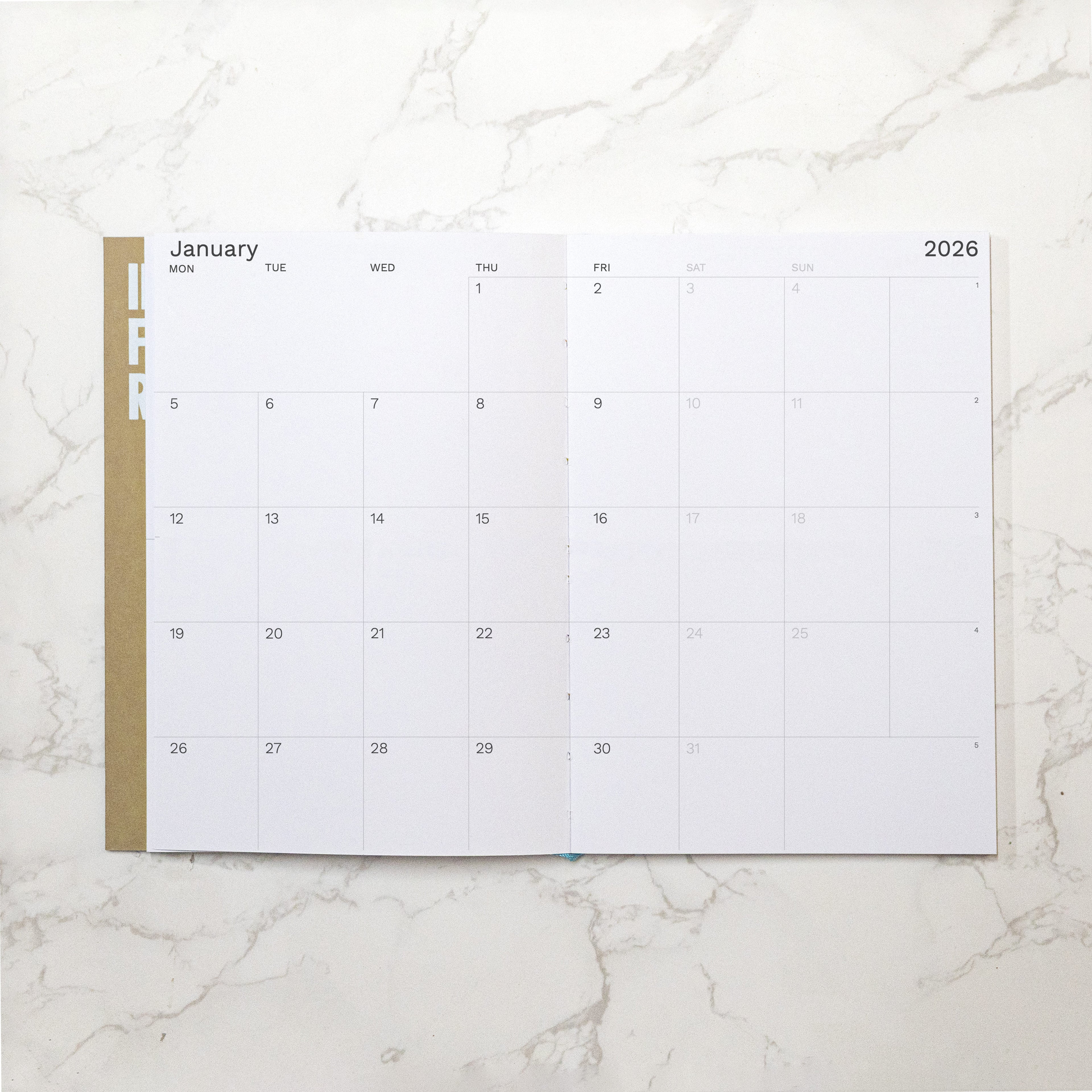 Best 2026 weekly planner A4 size from Octàgon Design. Camel color. Monthly view page.