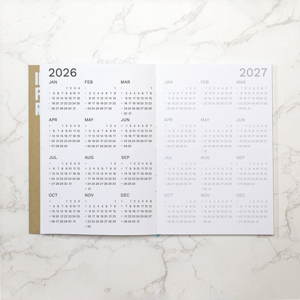 Best 2026 weekly planner A4 size from Octàgon Design. Camel color. Two years calendar pages.