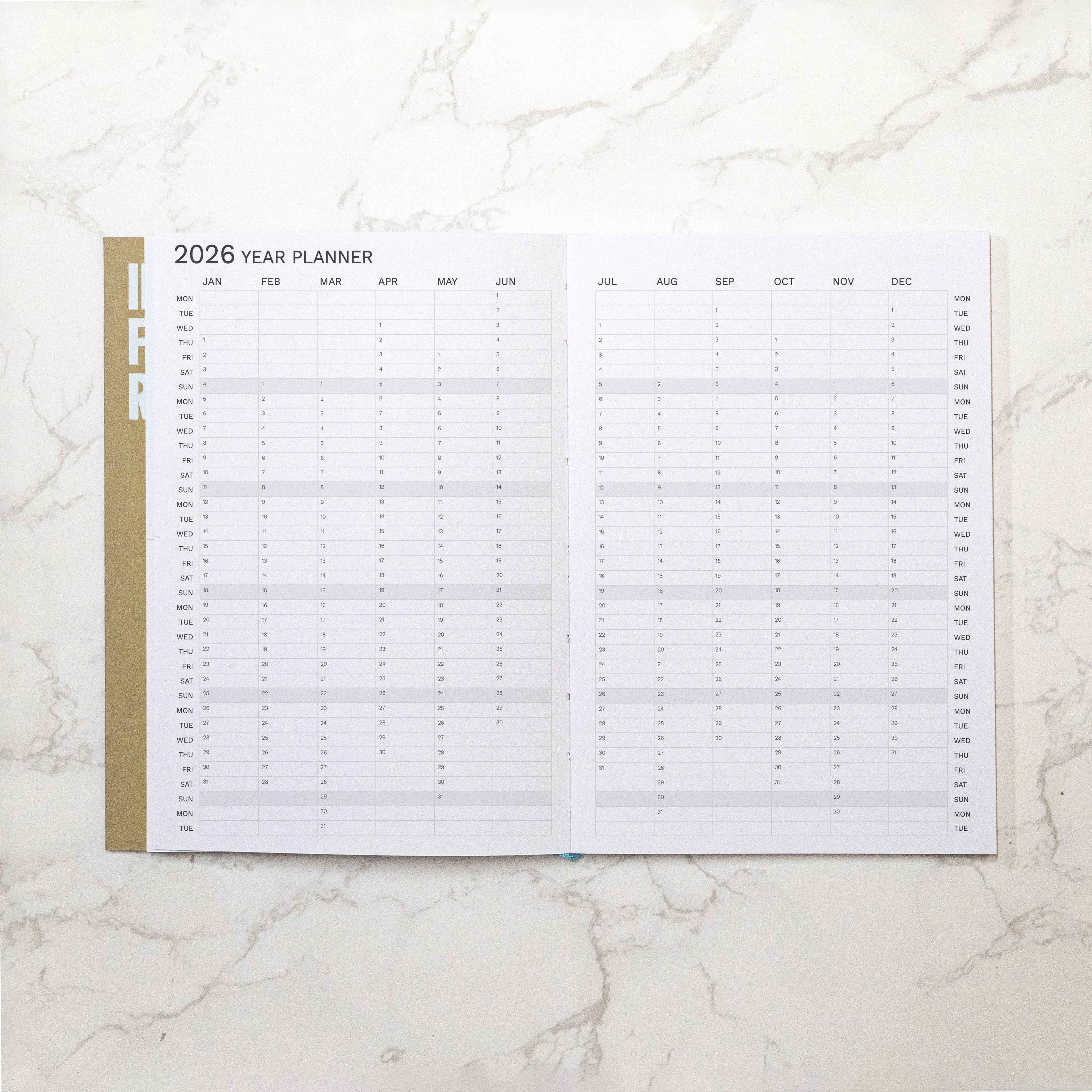 Best 2026 weekly planner A4 size from Octàgon Design. Camel color. Year Planner page.