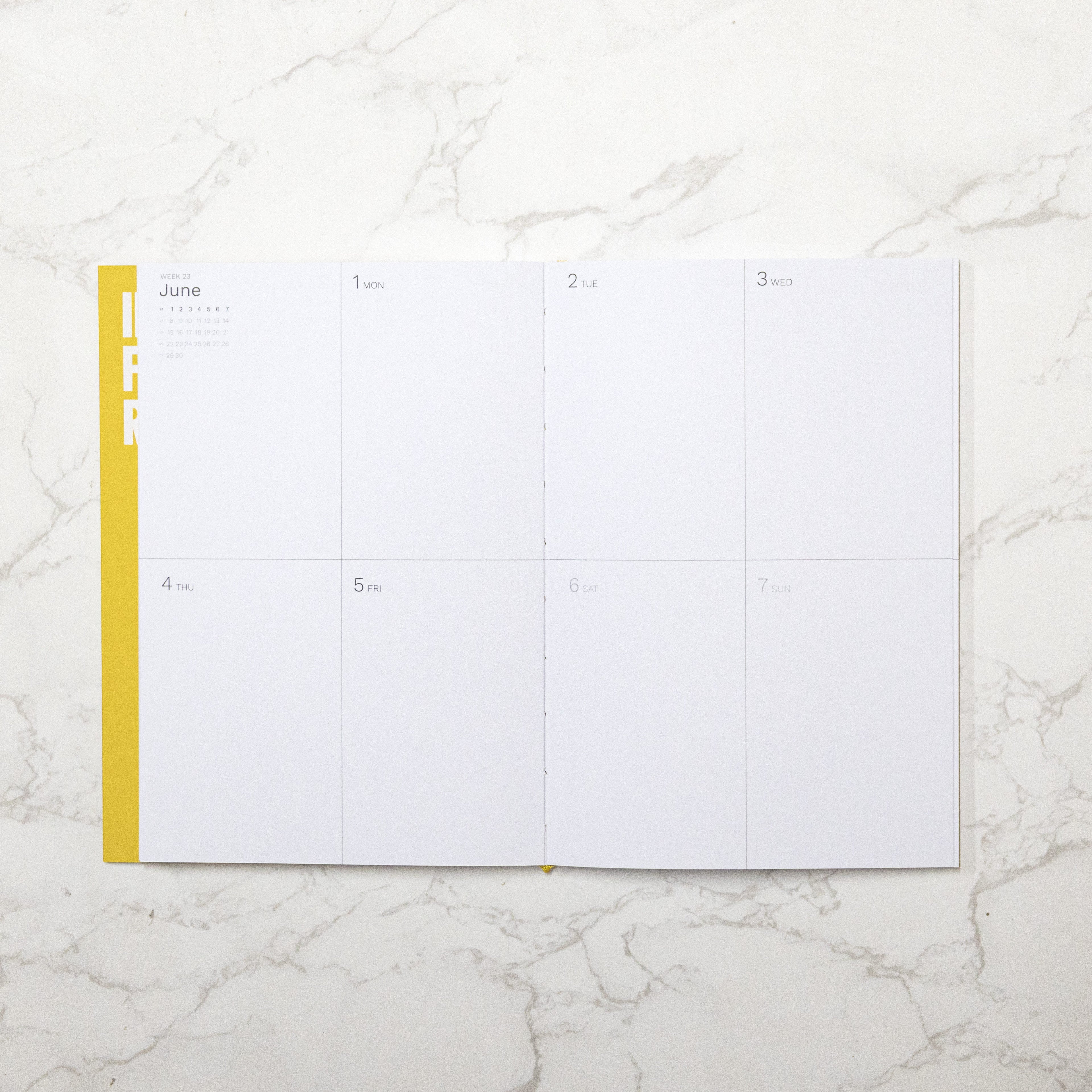 2026 Weekly Planner, best planner. From Octàgon Design. Indian Yellow color. Weekly view page.