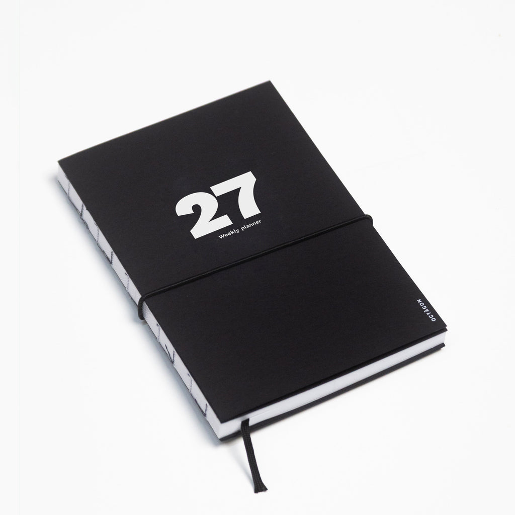 2027 Weekly Planner A5 by Octàgon Design. Black color. Main cover.