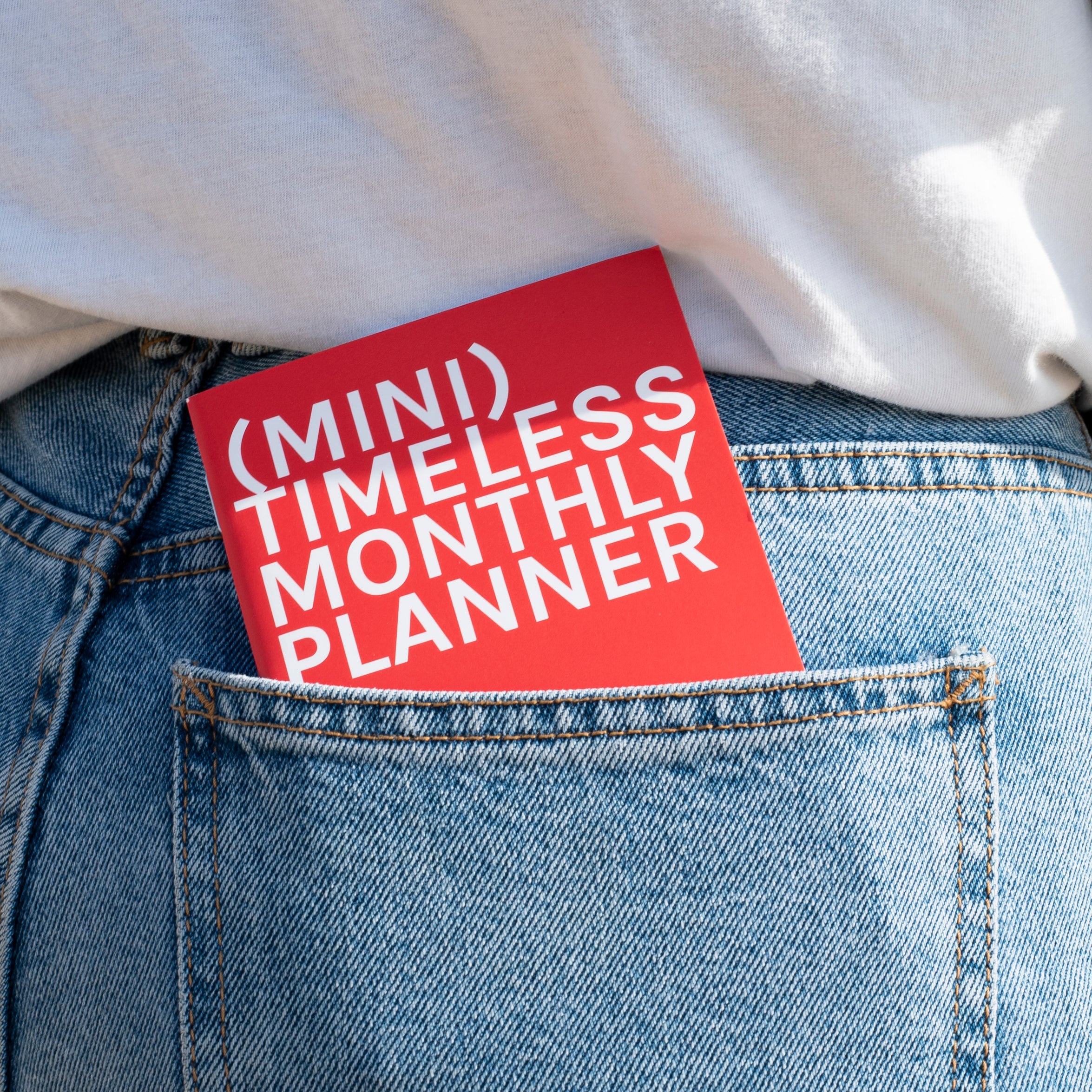 OCTÀGON DESIGN | "Mini Monthly Planner | Similar A6 Size" timeless monthly planner, red color, white typography.