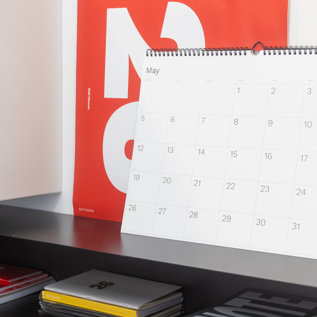 2027 Wall Planner by Octàgon Design. The calendar on a shelf.