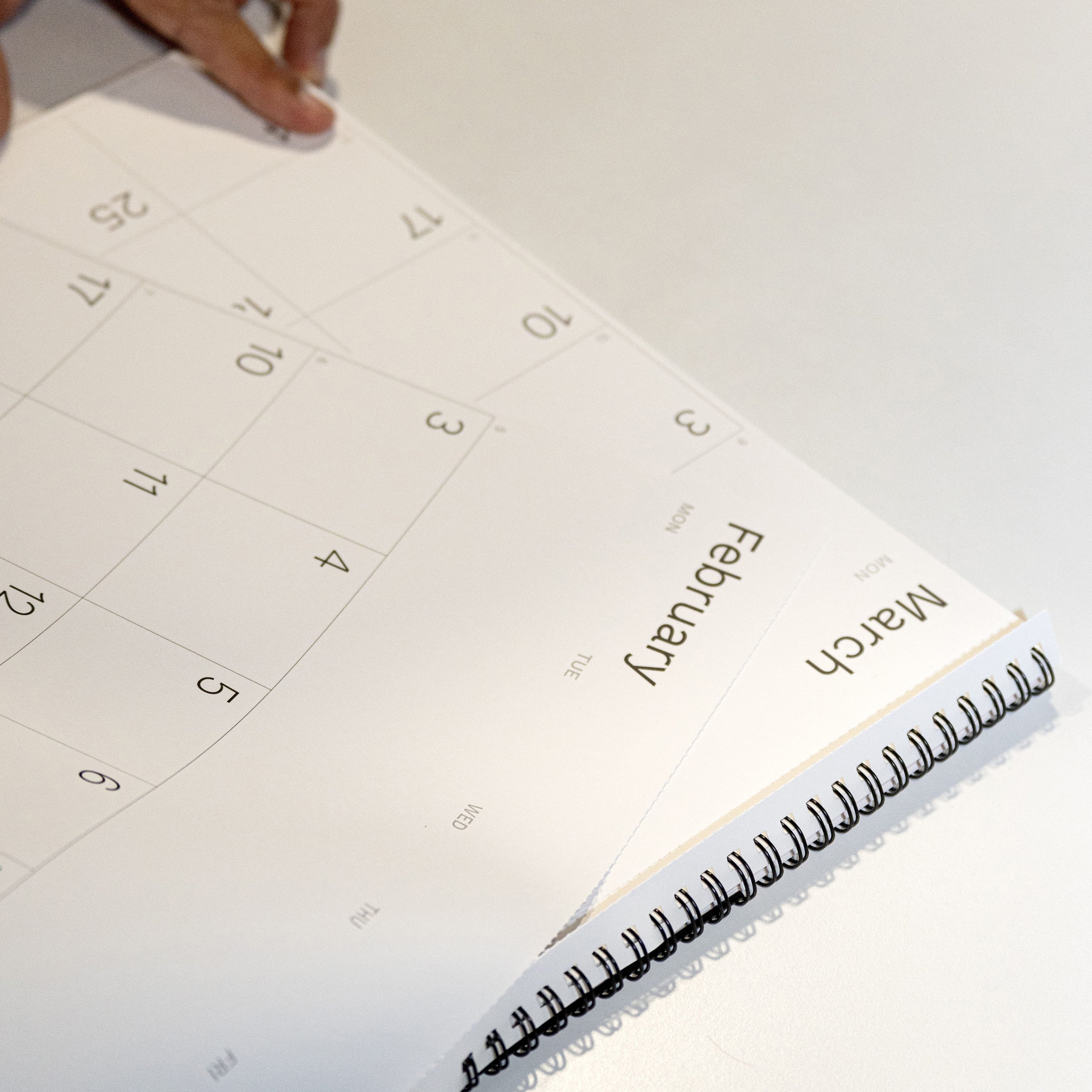 2027 wall planner by Octàgon Design. Detail of the cut mark for easy removal of each month.