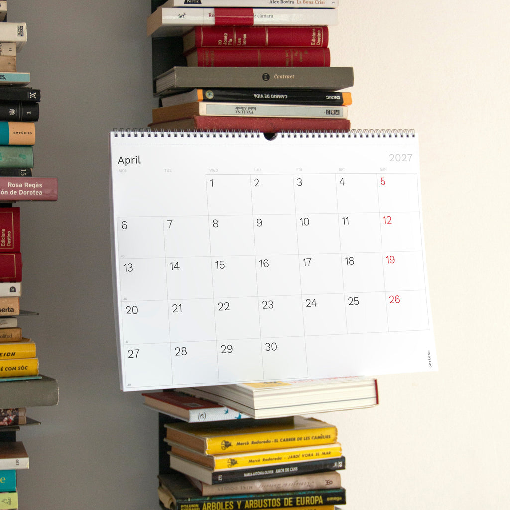 2027 Wall Planner by Octàgon Design. The calendar on a shelf showing the April page.