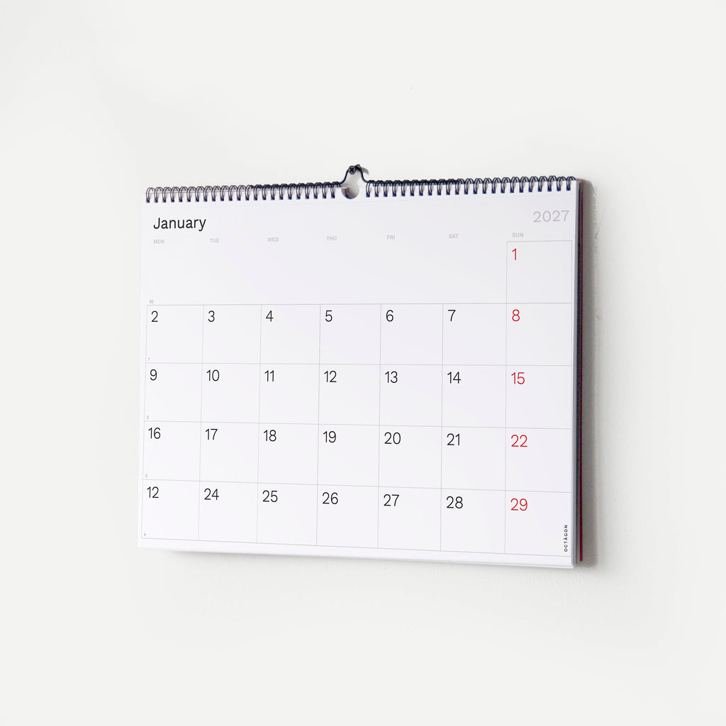 2027 Wall Planner by Octàgon Design. The calendar hanging on the wall showing the January page.