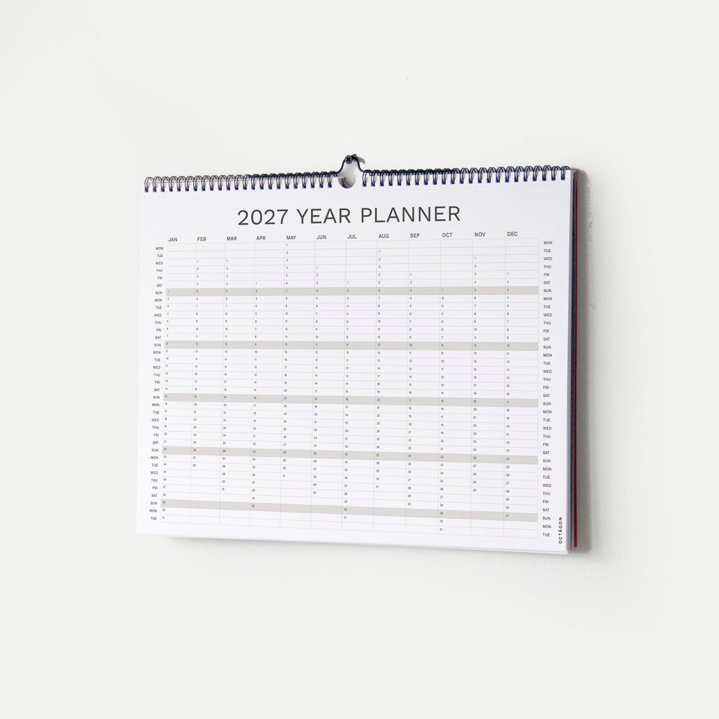 2027 Wall Planner by Octàgon Design. The calendar hanging on the wall showing the 2027 Year Planner.