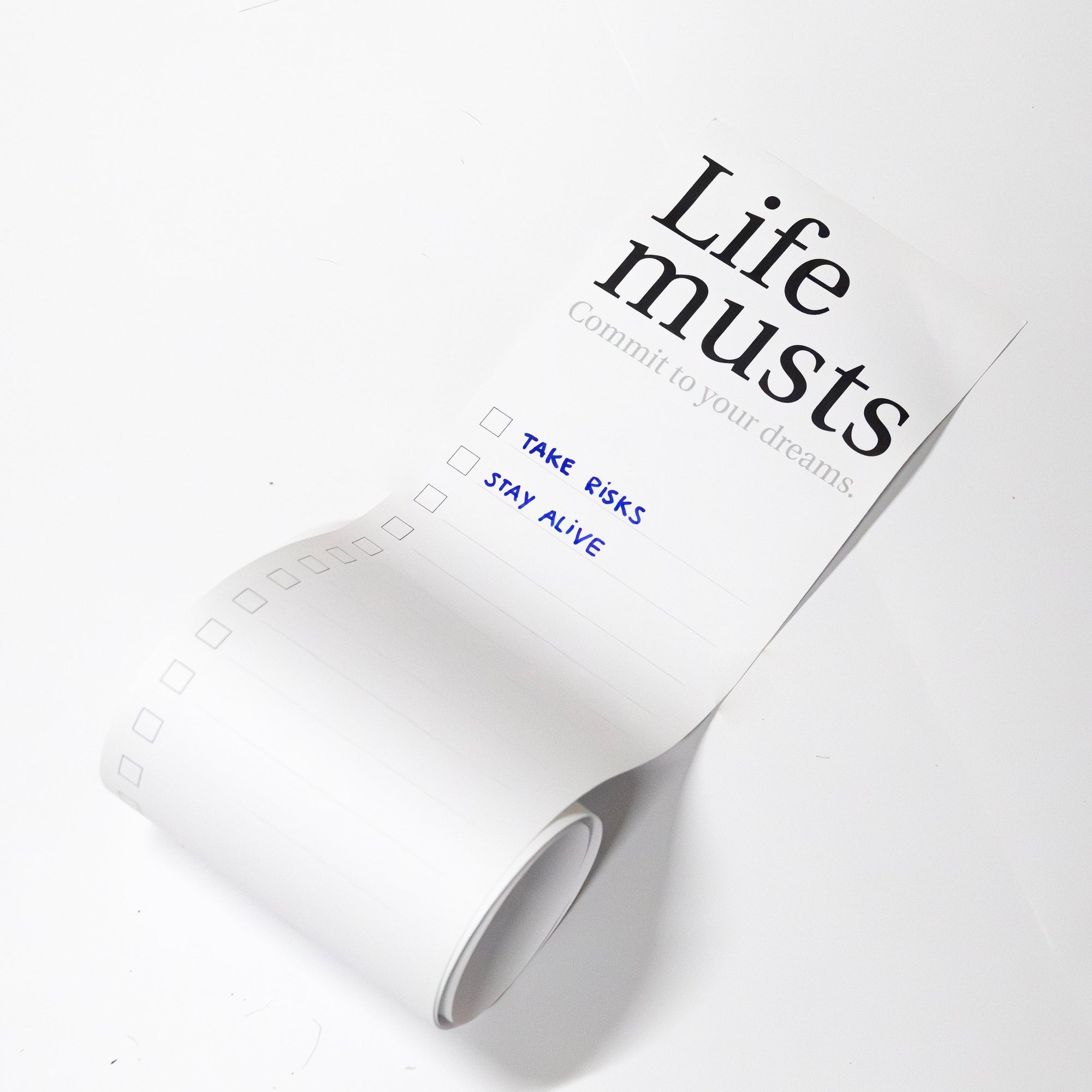 Motivational Life Musts poster and checkboxes on a white background