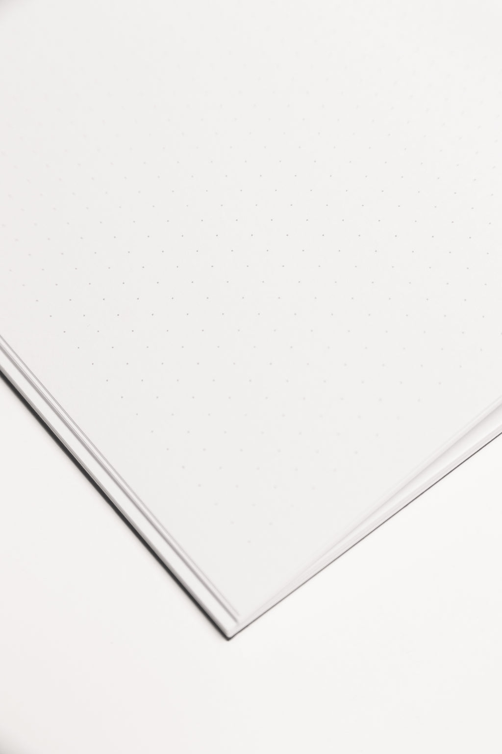 Open Spine Notebook 13,5x20 cm (80 pages) · Dotted. Lay-flat opened notebook. Black color.