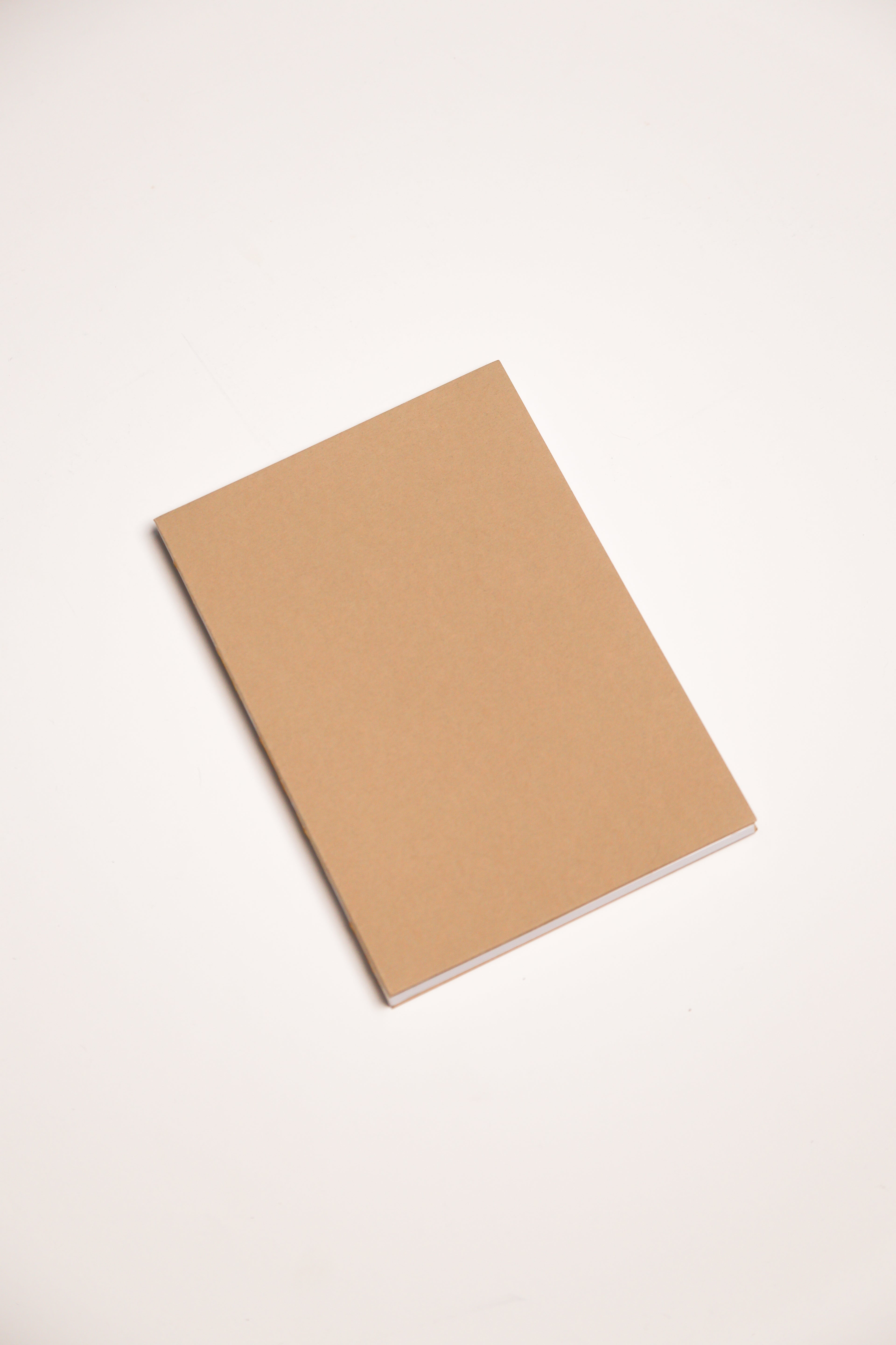 Open Spine Notebook 13,5x20 cm (80 pages) · Dotted. Camel color cover.
