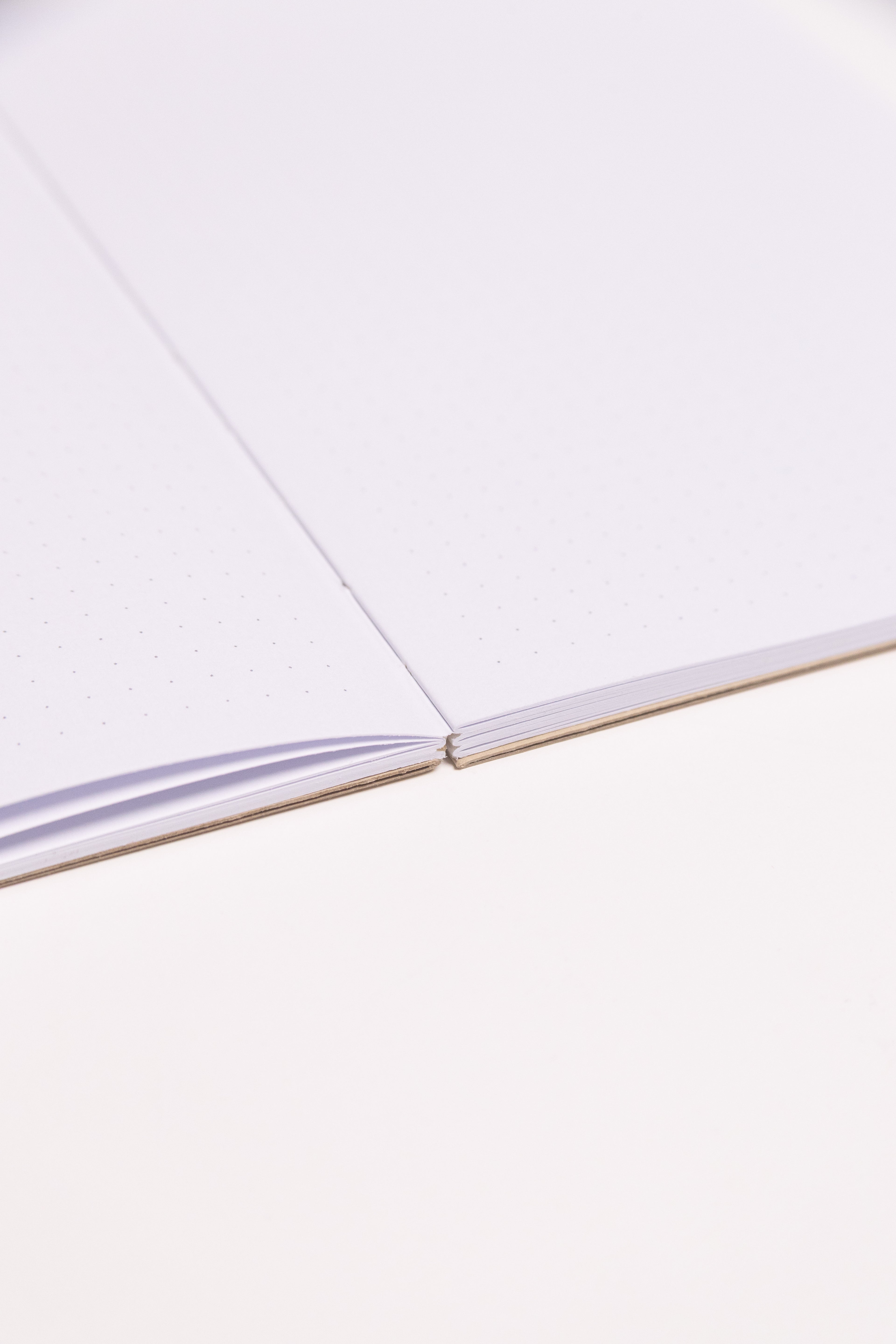 Open Spine Notebook 13,5x20 cm (80 pages) · Dotted. Lay-flat opened notebook. Camel color.