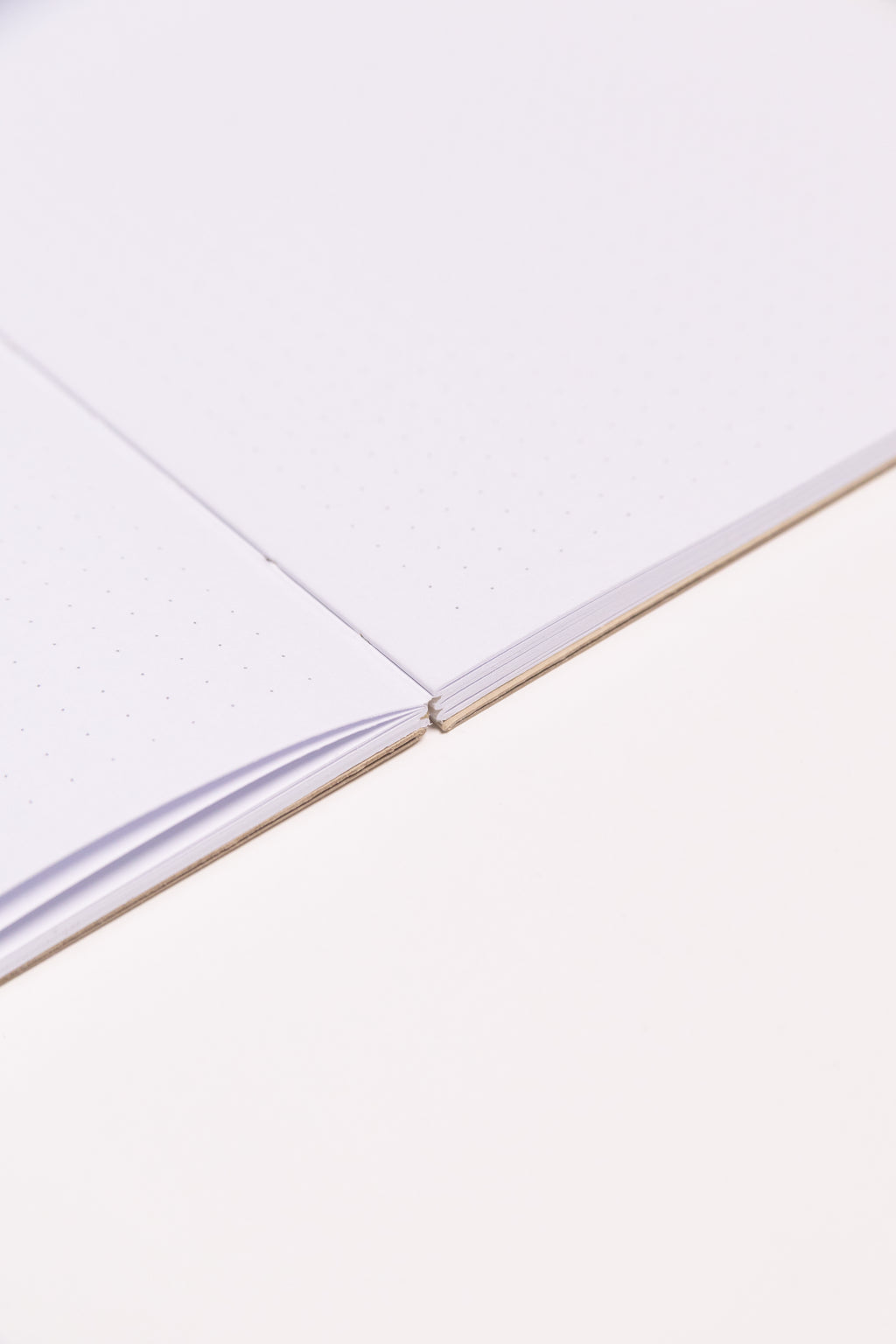 Open Spine Notebook 13,5x20 cm (80 pages) · Dotted. Lay-flat opened notebook. Camel color.