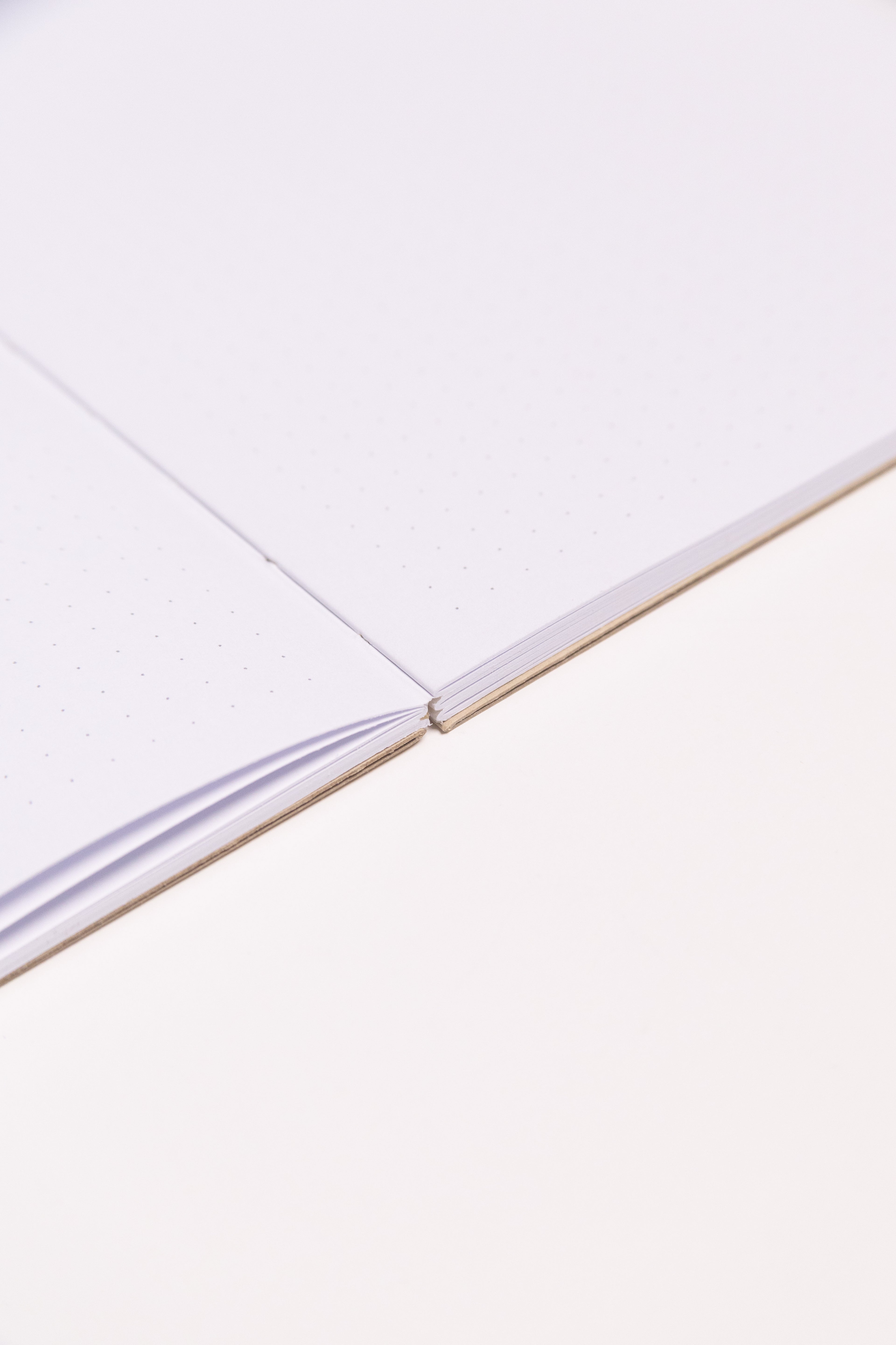 Open Spine Notebook 13,5x20 cm (80 pages) · Dotted. Lay-flat opened notebook. Camel color.