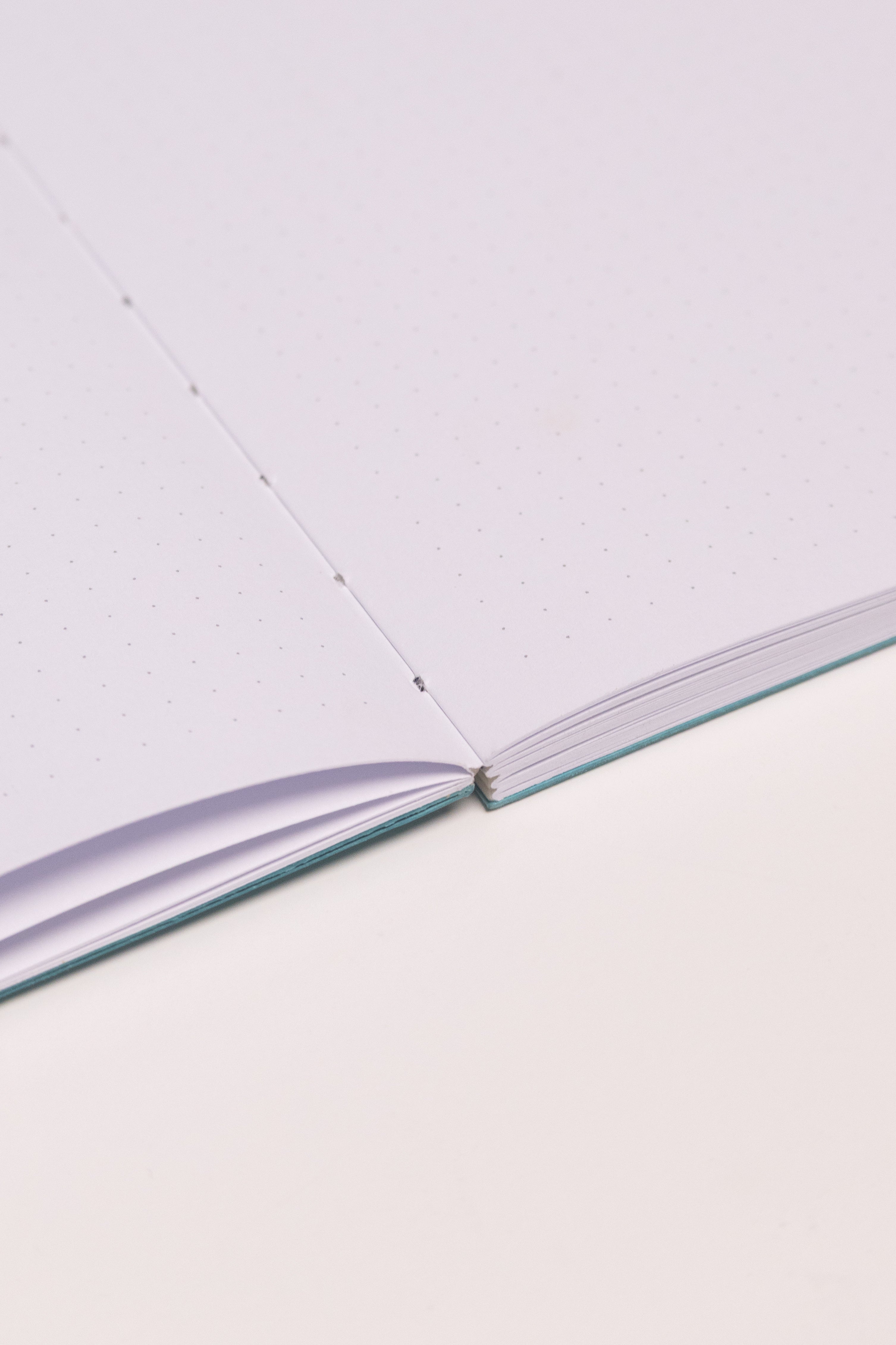 Open Spine Notebook 13,5x20 cm (80 pages) · Dotted. Lay-flat opened notebook.  Caribbean Blue color.