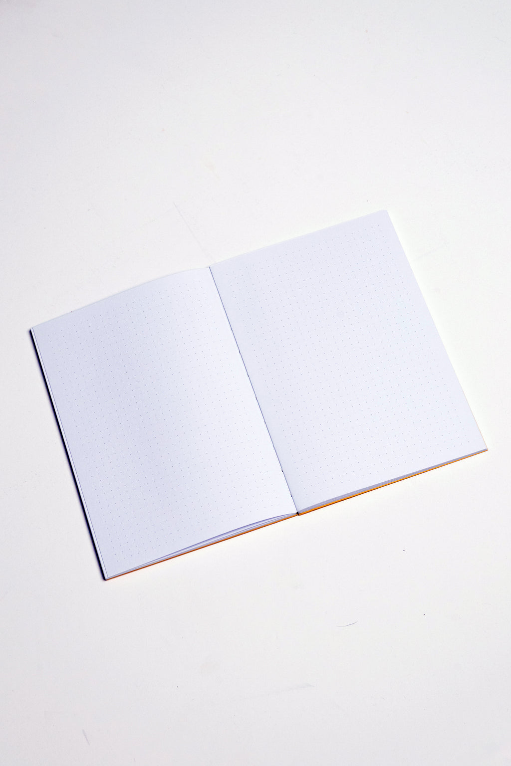 Open Spine Notebook 13,5x20 cm (80 pages) · Dotted. Lay-flat opened notebook. Indian Yellow color.