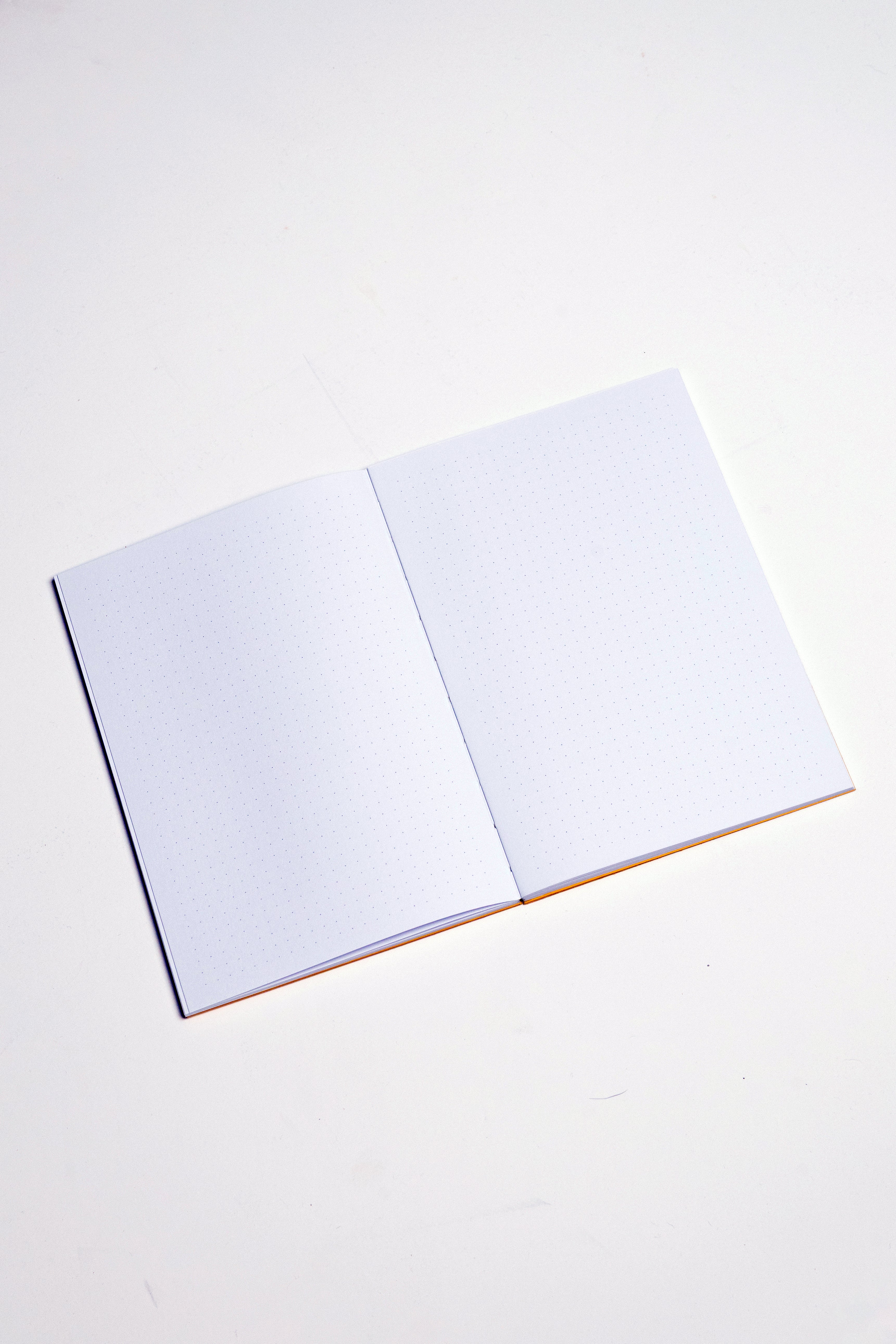 Open Spine Notebook 13,5x20 cm (80 pages) · Dotted. Lay-flat opened notebook. Indian Yellow color.