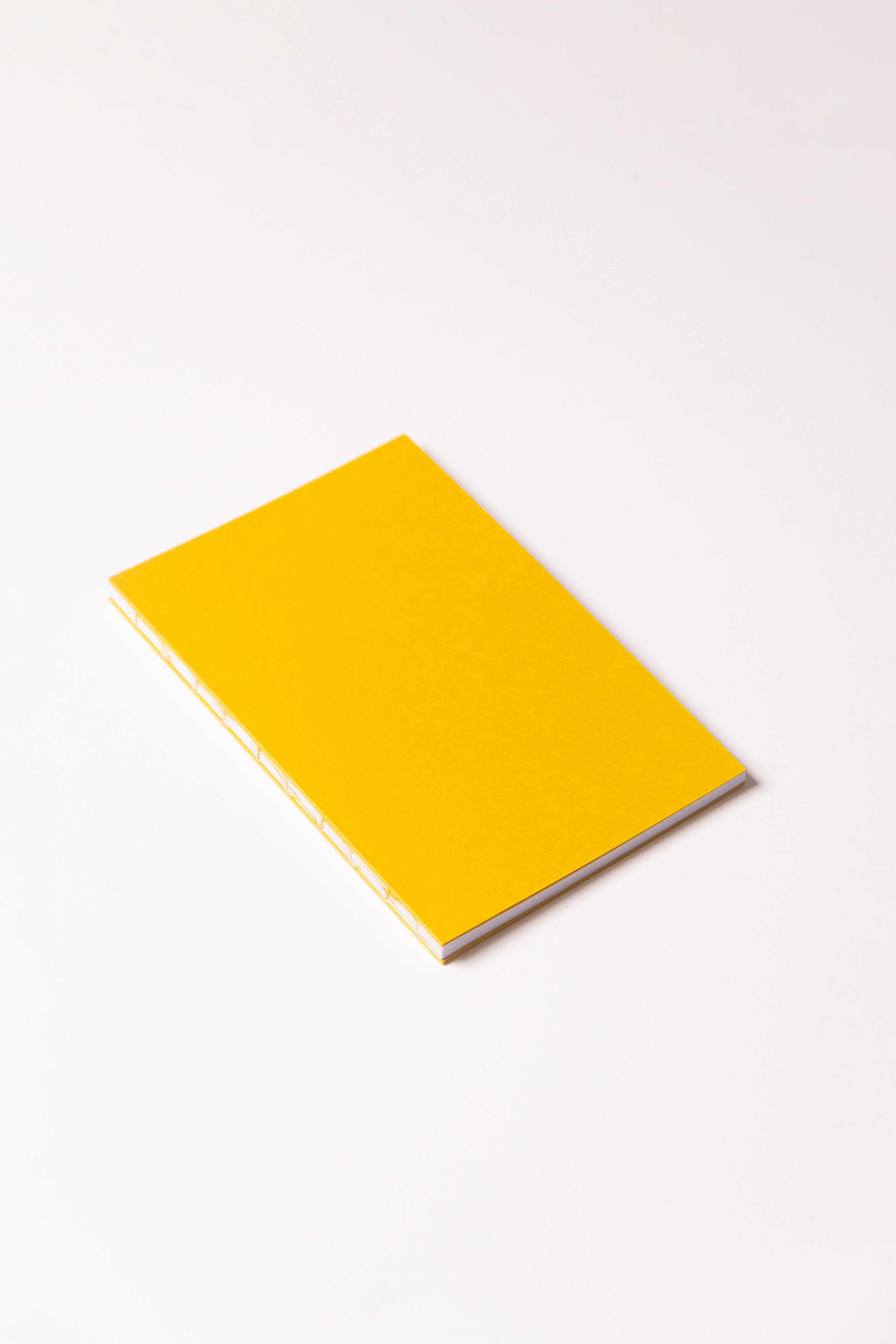 Open Spine Notebook 13,5x20 cm (80 pages) · Dotted. Indian Yellow color cover.