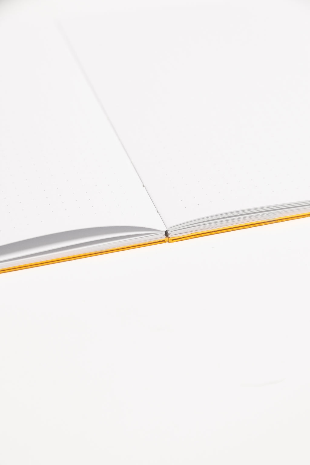 Open Spine Notebook 13,5x20 cm (80 pages) · Dotted. Lay-flat opened notebook. Indian Yellow color.