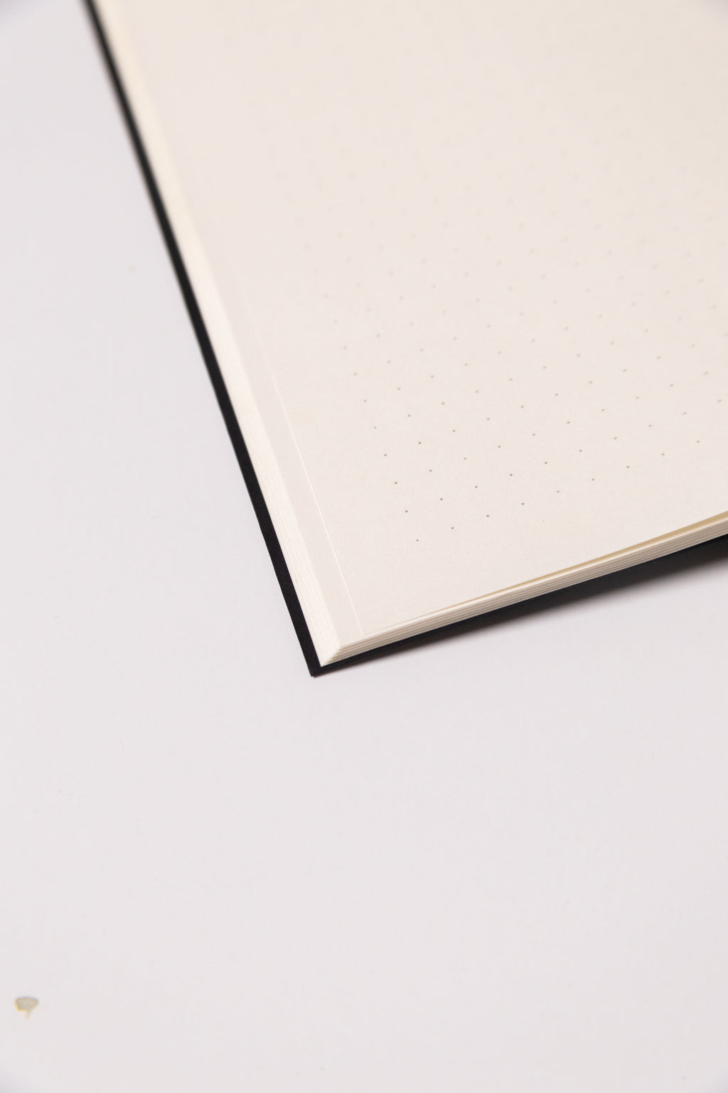 Black Dotted Notebook 13.5x20 cm (A5) | Octàgon Design. Dotted paper.