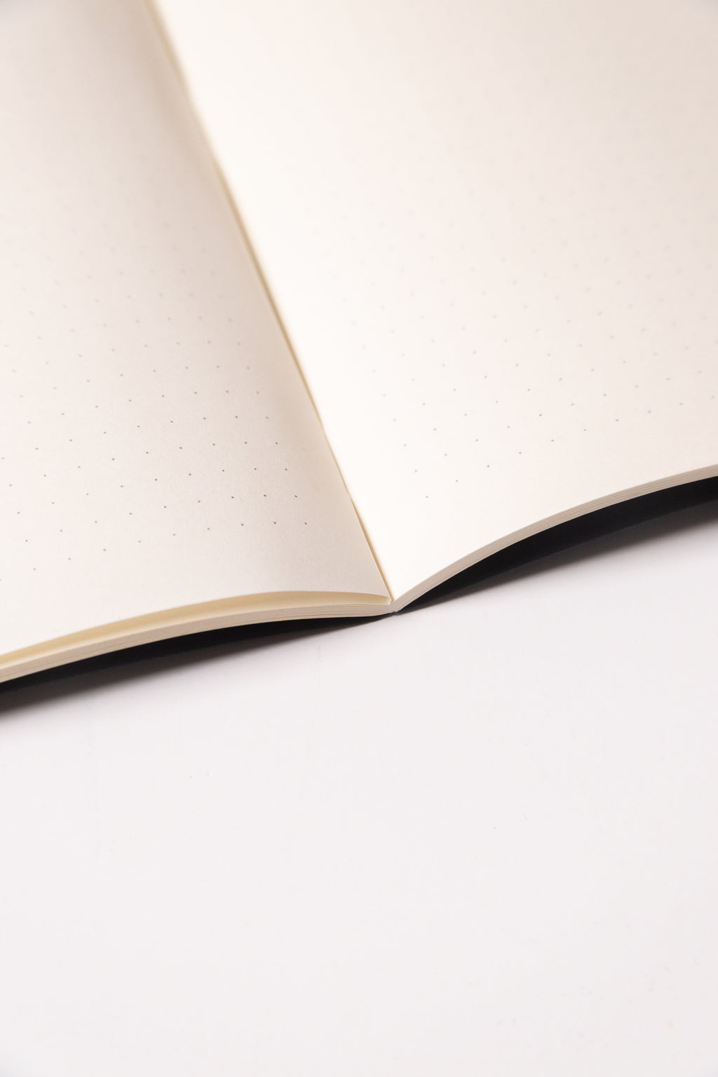 Black Dotted Notebook 13.5x20 cm (A5) | Octàgon Design. Dotted paper.