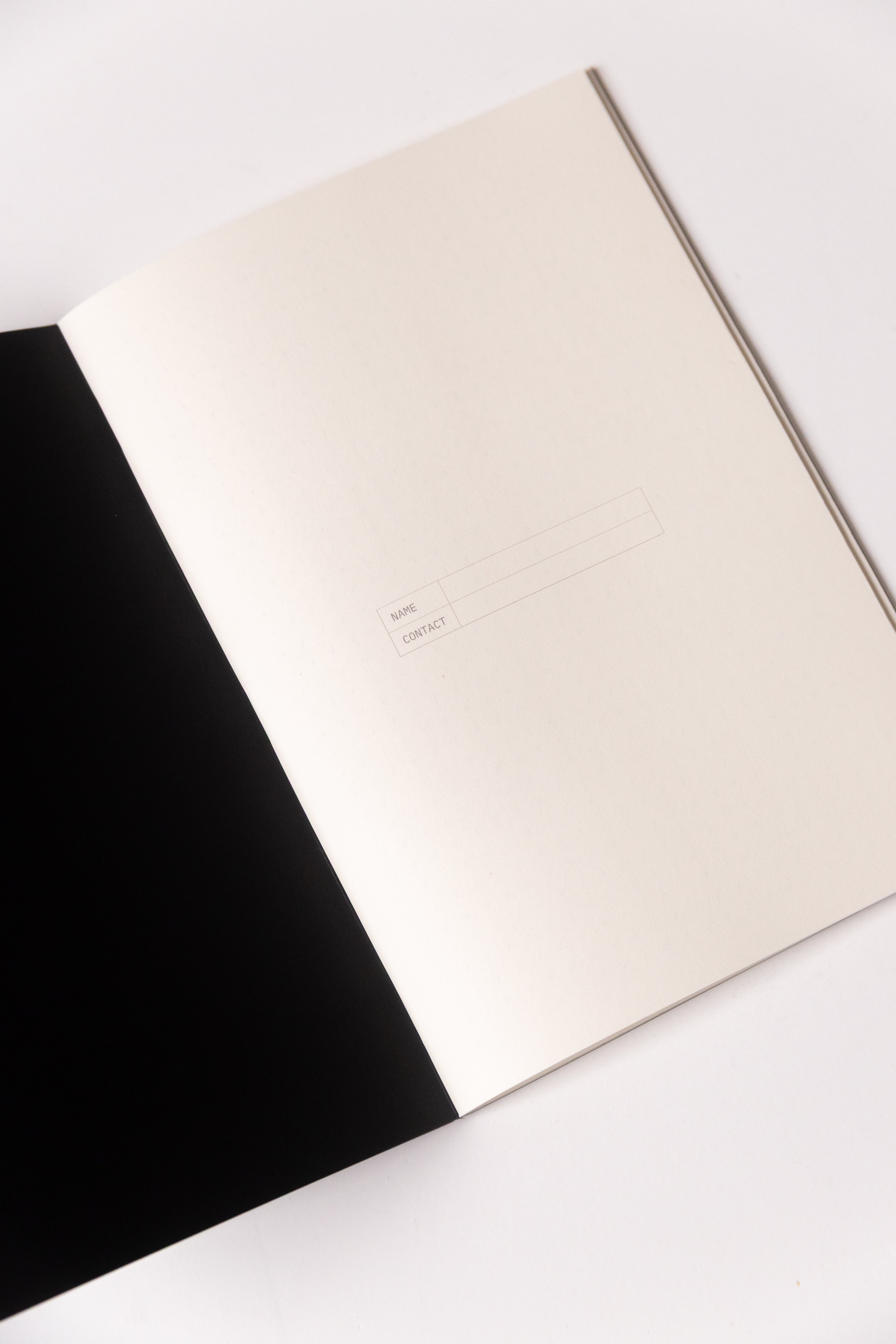 Black Dotted Notebook 13.5x20 cm (A5) | Octàgon Design. First page.