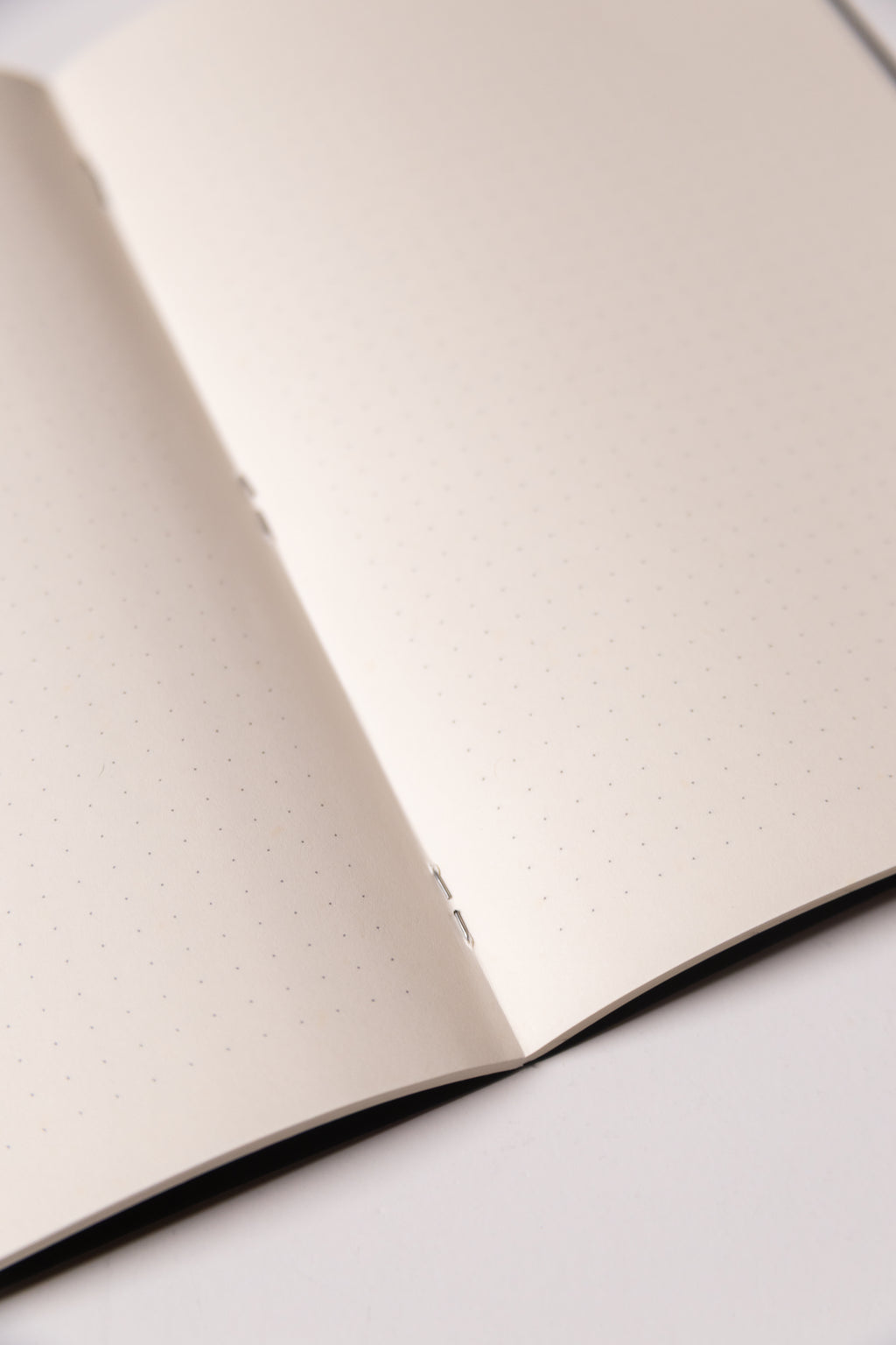 Black Dotted Notebook 13.5x20 cm (A5) | Octàgon Design. Detail