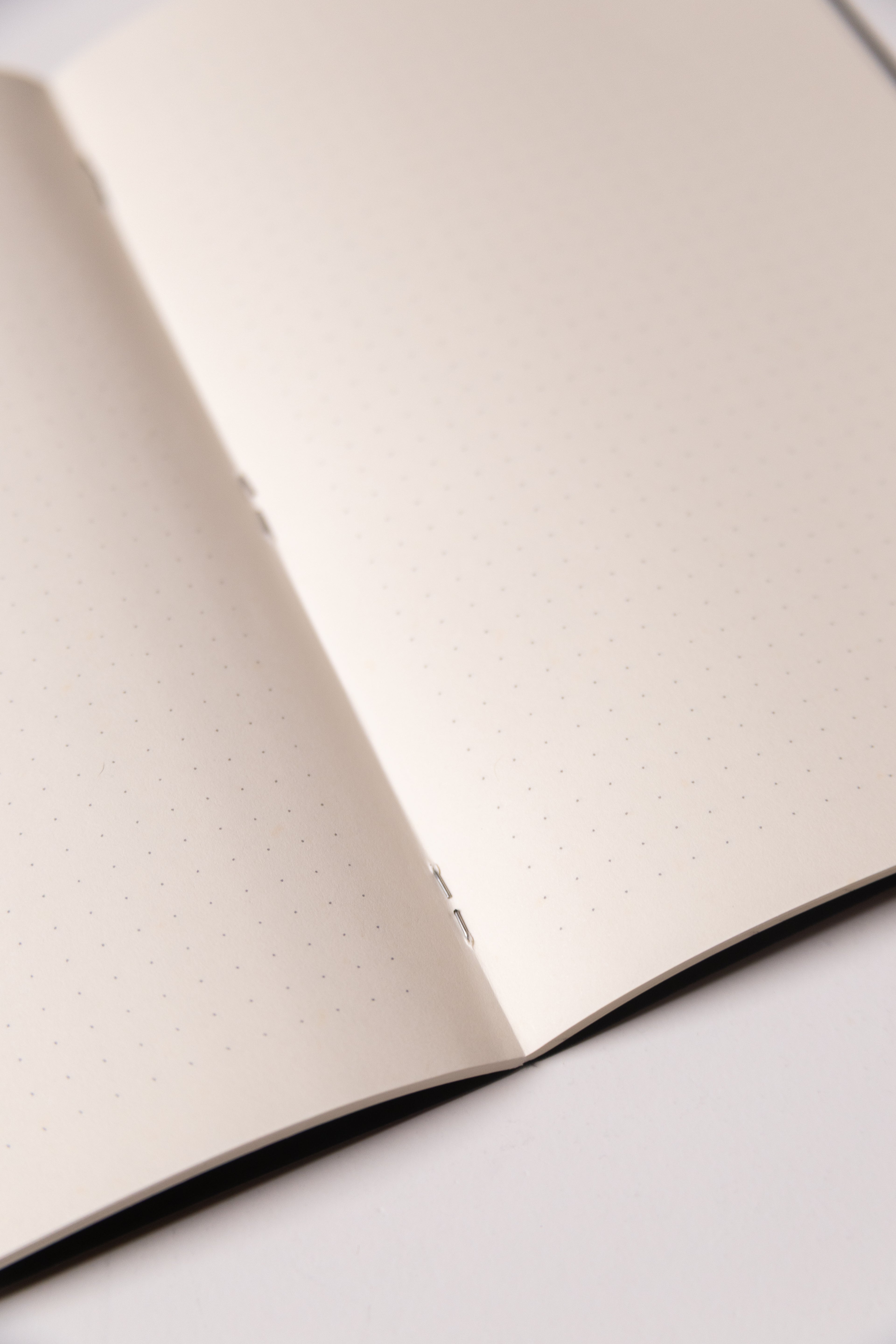 Black Dotted Notebook 13.5x20 cm (A5) | Octàgon Design. Detail