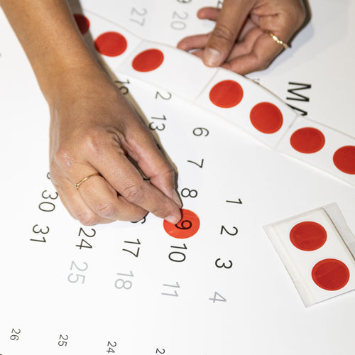 Transparent and red Magic Date Markers from Octàgon Design