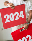 OCTÀGON DESIGN | 2024 Vinçon Wall Calendar | Red and white bag