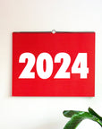 OCTÀGON DESIGN | 2024 Vinçon Wall Calendar | Red and black typography